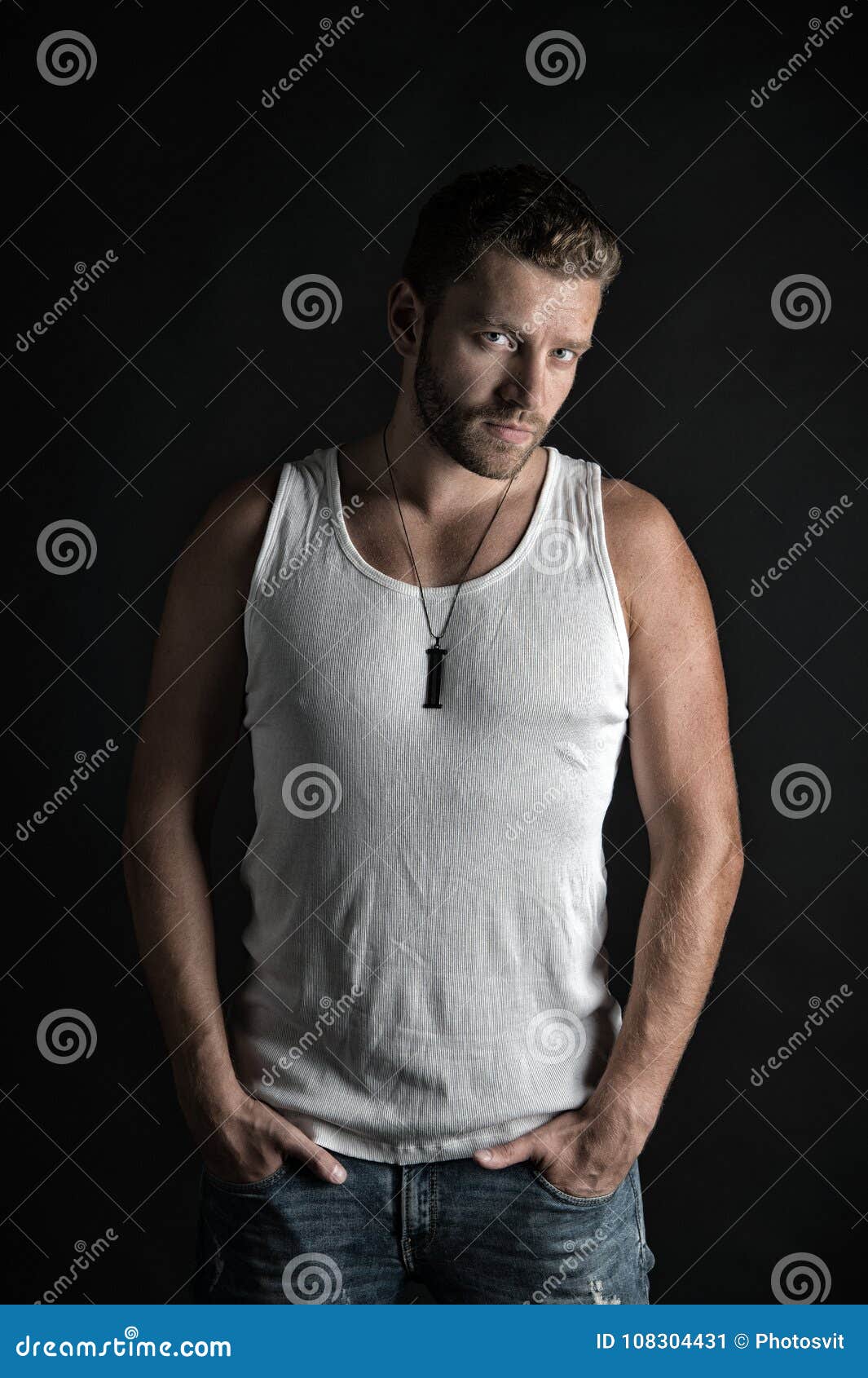 handsome mucho guy in vest.