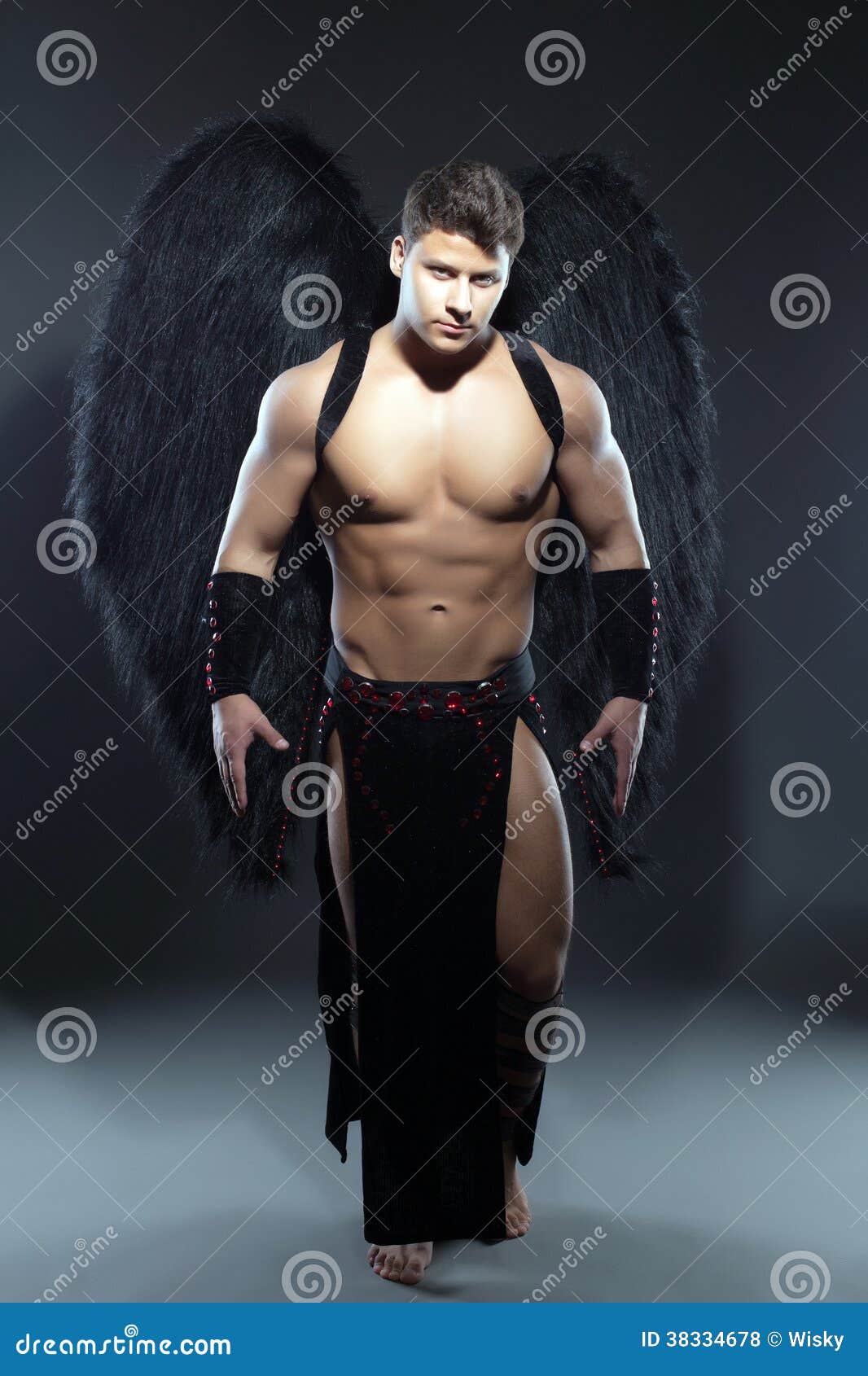 Handsome Muscular Guy Posing As Fallen Angel Stock Photo - Image of ...