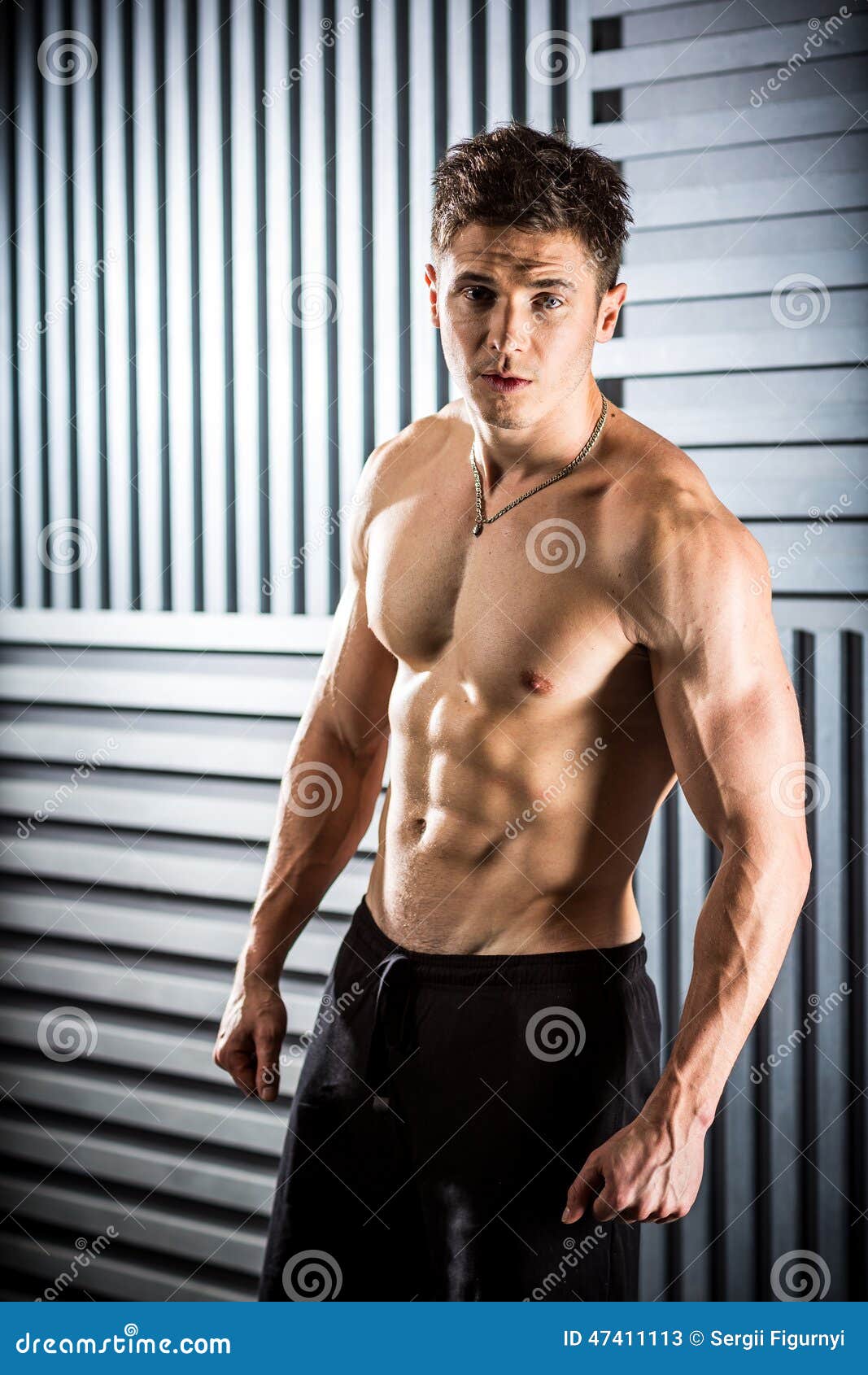 Premium Photo  Fashion portrait of a very muscular sexy man in