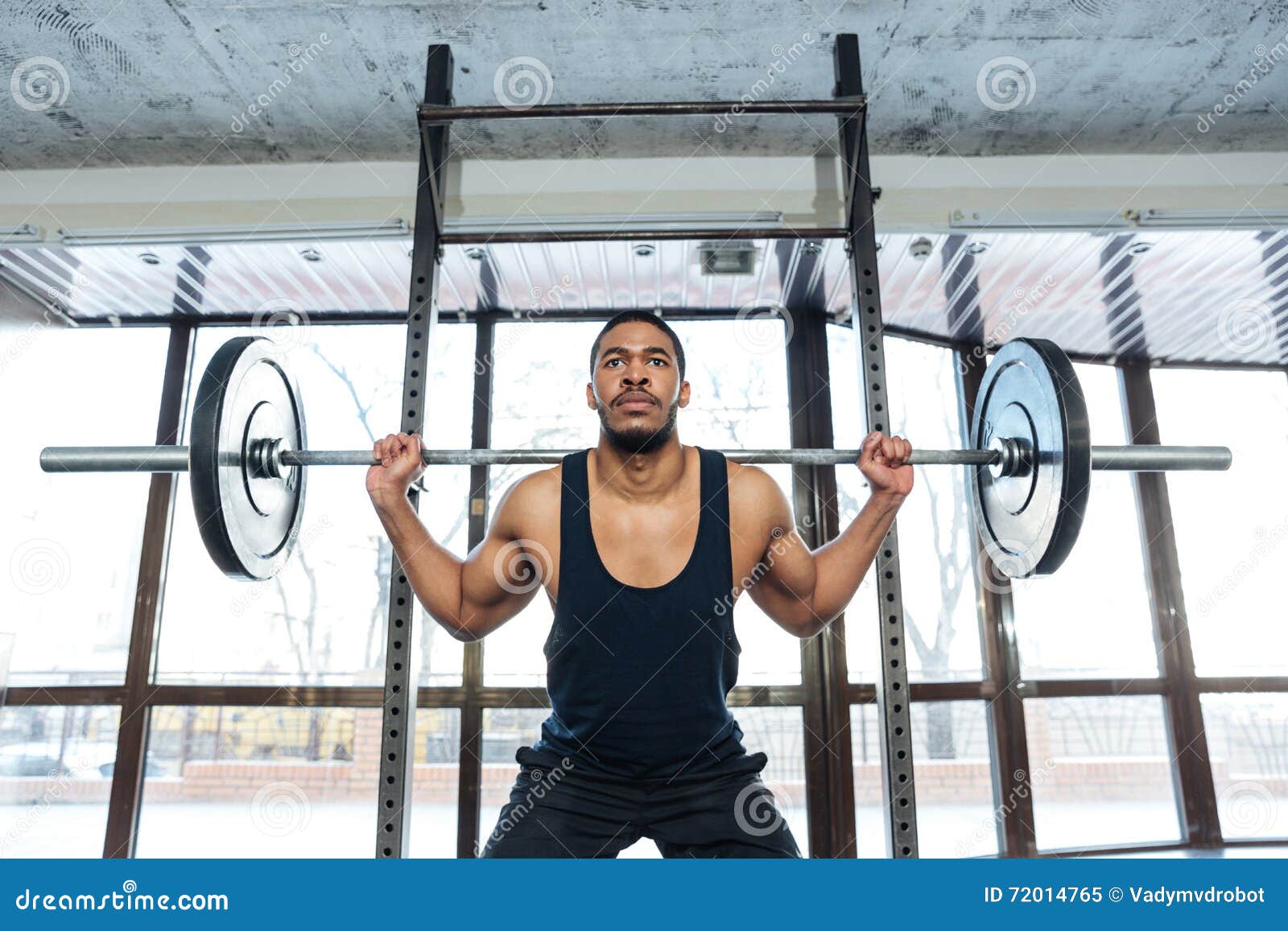 Muscular Weightlifter Woman Clapping Hands Before Barbell Workout At