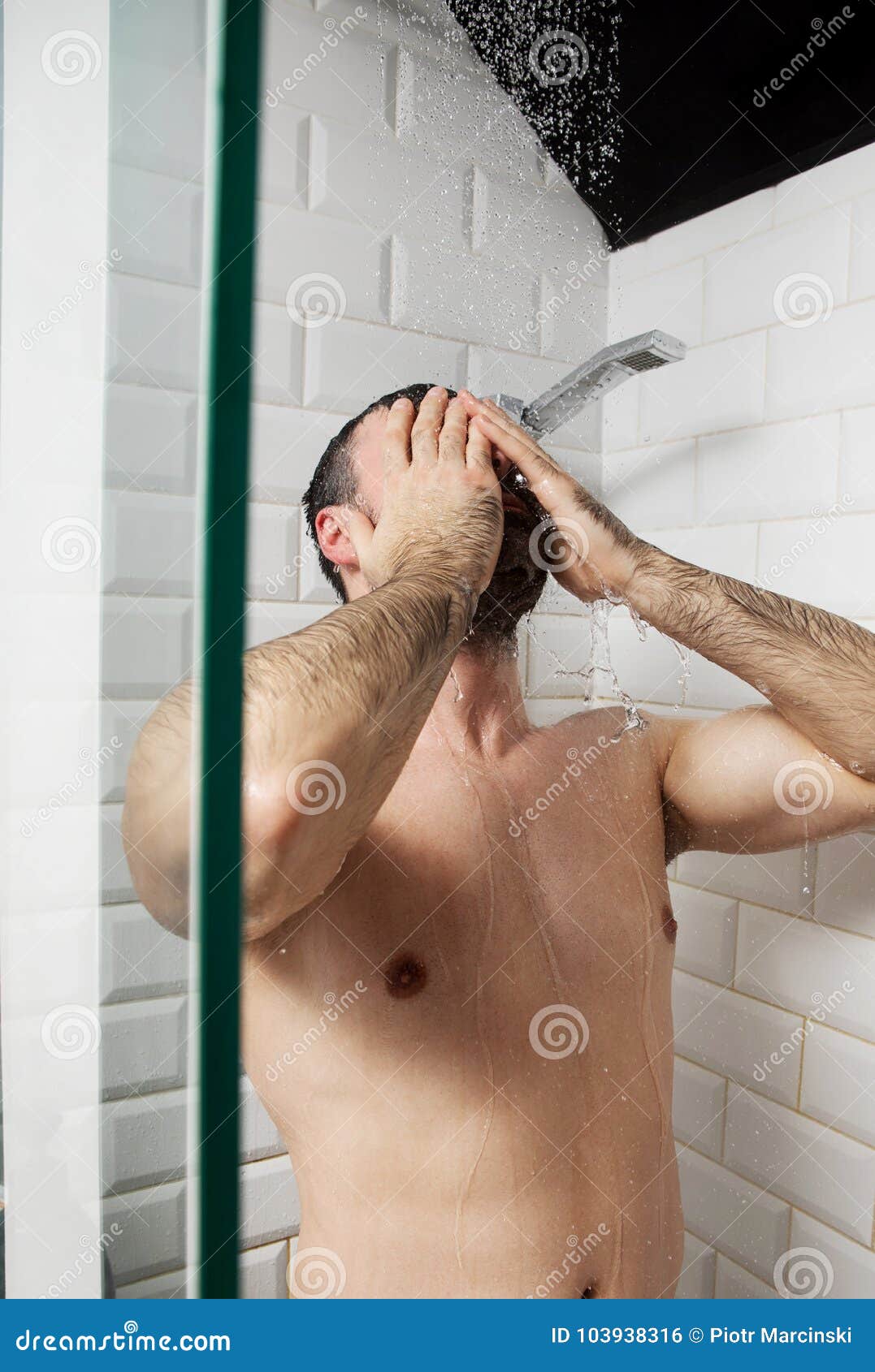 Men showering together naked.