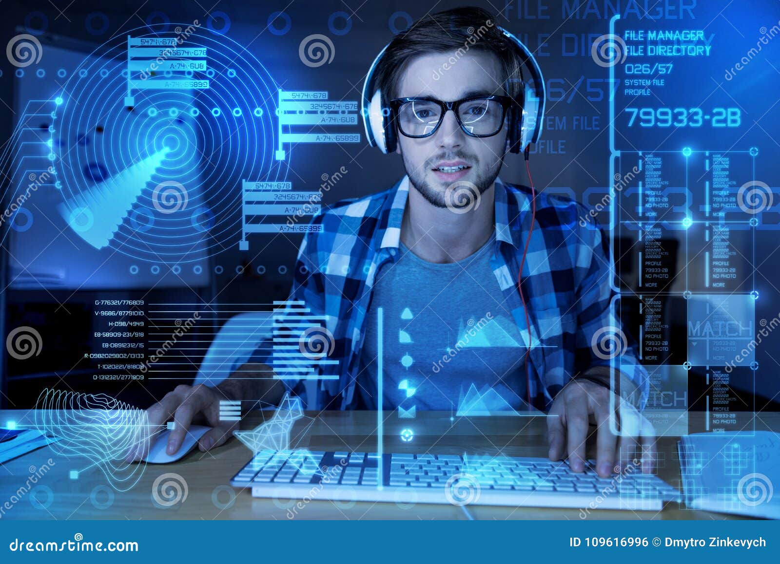 handsome programmer listening to music while working in the office