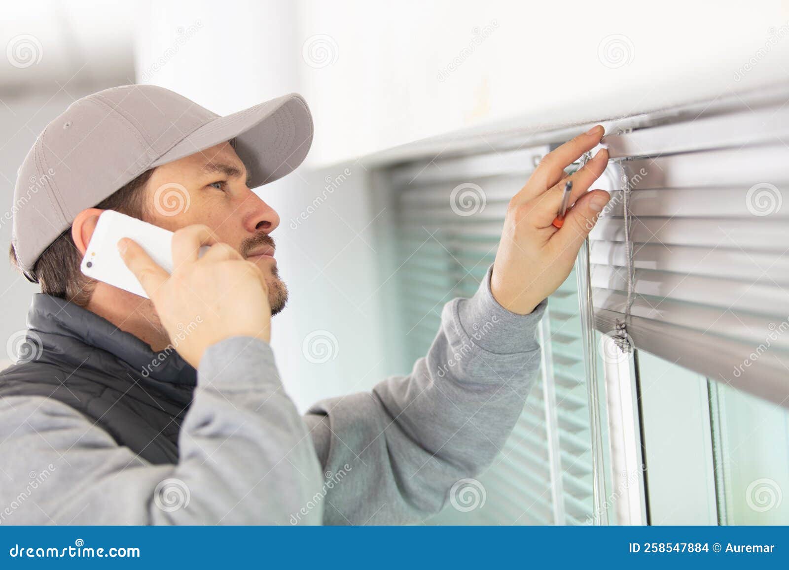 Handsome Repairman Working on Renovation Apartment Interior Stock Photo Image of professional