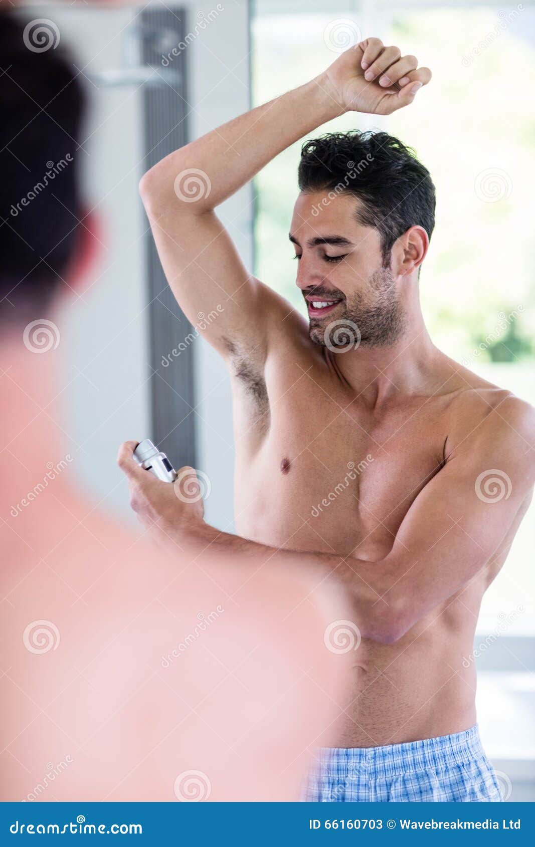 Handsome Shirtless Man Putting Deodorant Stock Image Image of focused