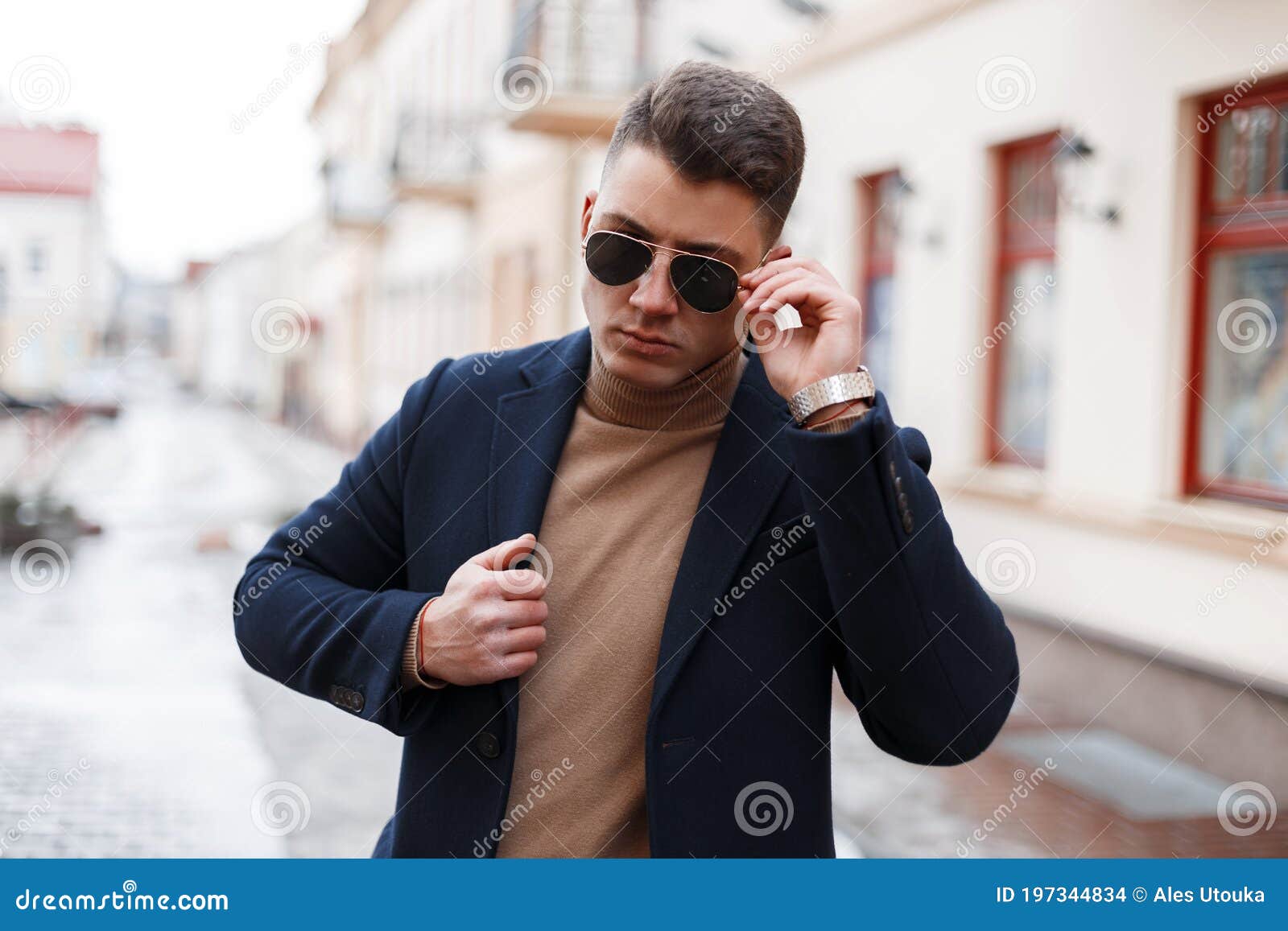 Handsome Successful Young Businessman in an Elegant Coat with Silver Clock  in Sunglasses in a Knitted Warm Sweater with a Stylish Stock Photo - Image  of american, knitted: 197344834
