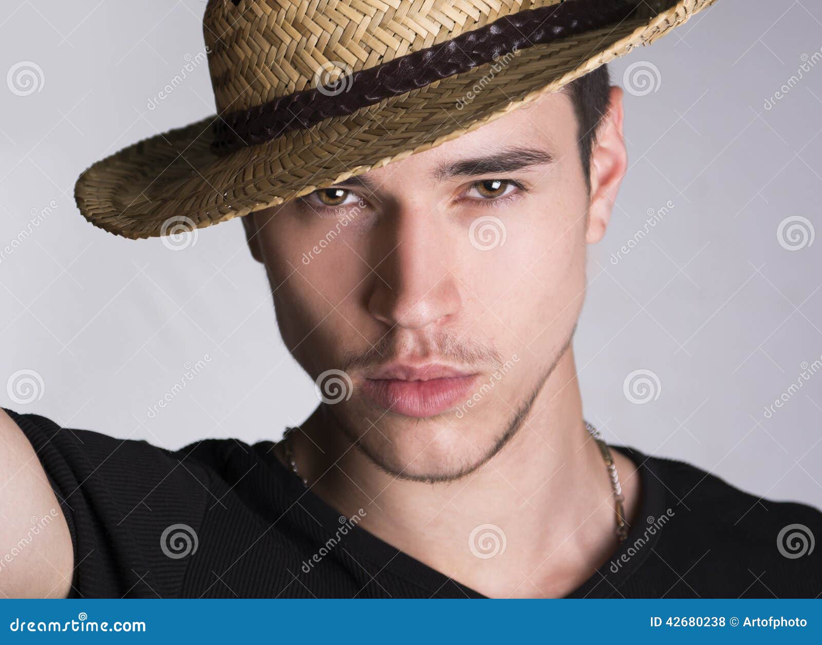 Handsome Sultry Young Man with Straw Hat Stock Photo - Image of good ...