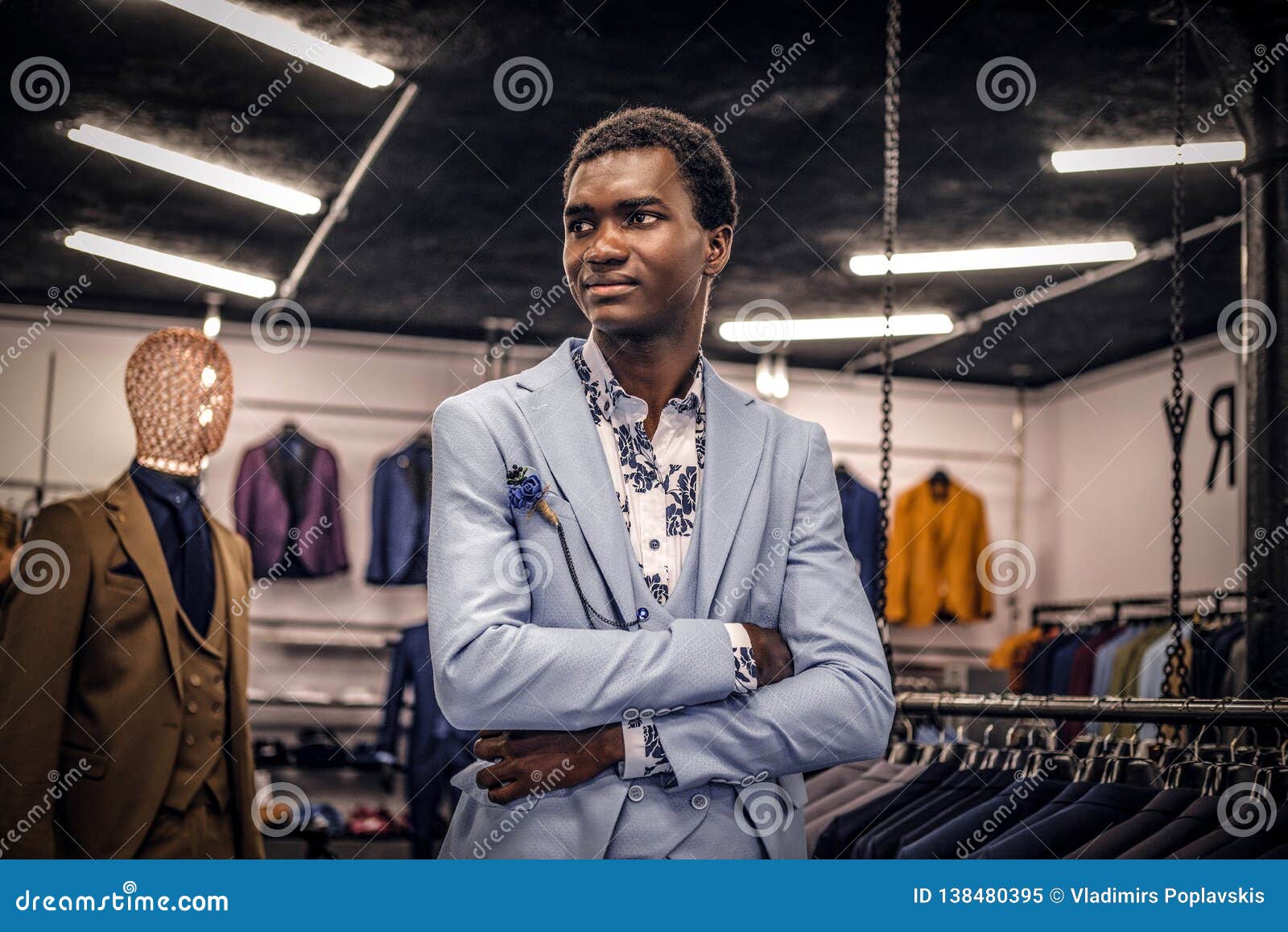 African-American Man Dressed in Blue Elegant Suit Posing with Crossed ...
