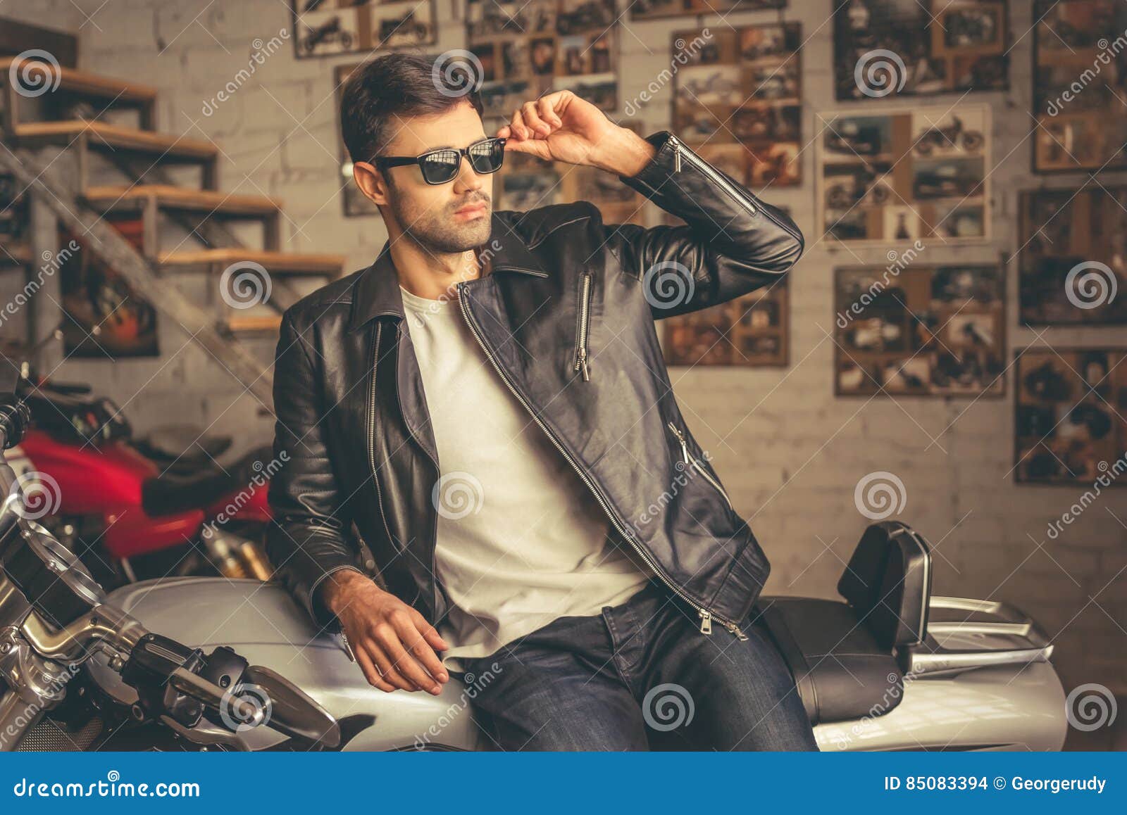 Handsome young biker stock photo. Image of cool, lifestyle - 85083394