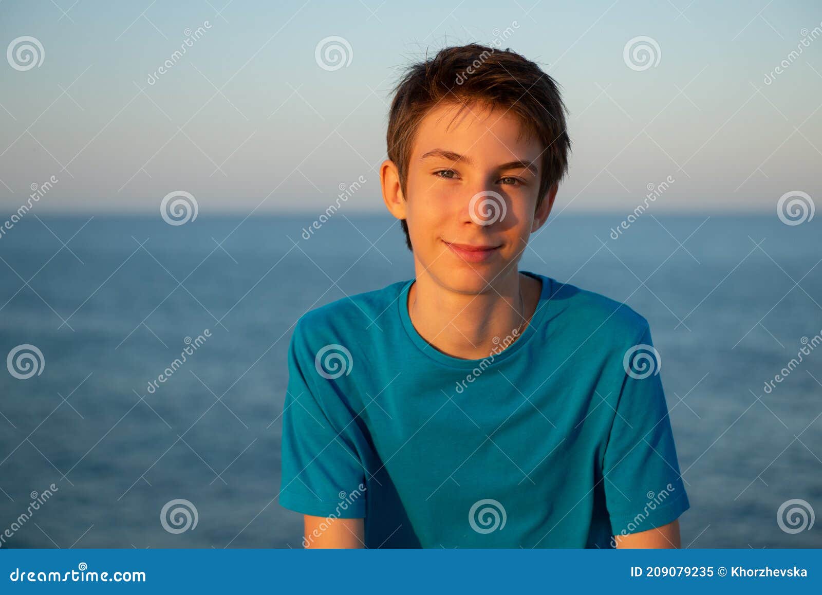 Handsome Young Boy at Beach. Beautiful Calm Smiling Teen Boy at ...