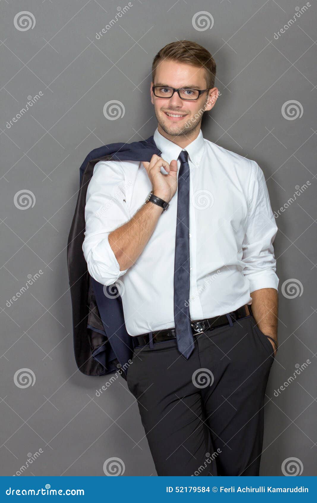 A Handsome Young Businessman Wearing Glasses and Smiling. Vertic Stock ...