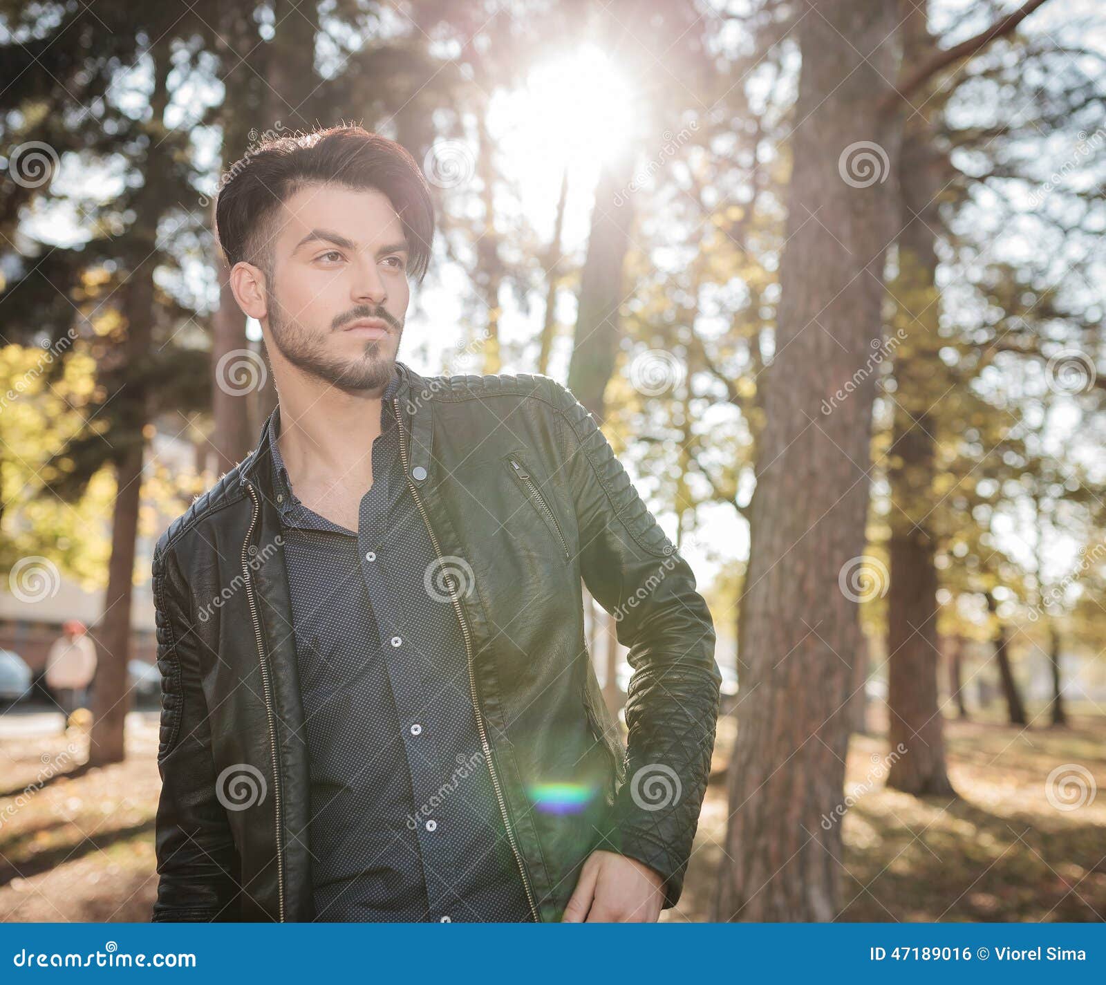 Handsome Young Fashion Man Posing In The Park Stock Photo Image Of Cold Casual 47189016 dreamstime com