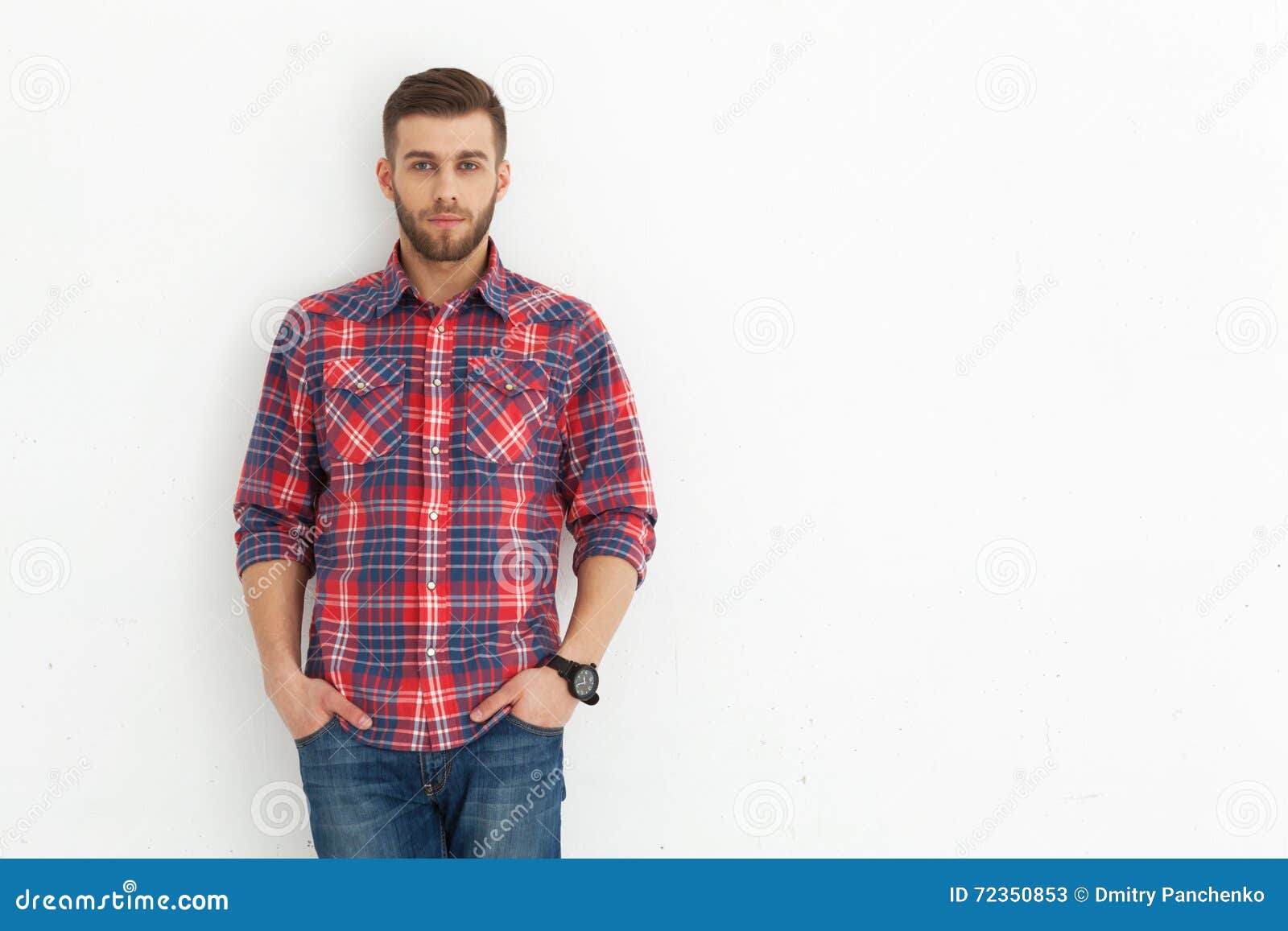 Handsome Young Guy Standing Against White Wall. Stock Image - Image of ...