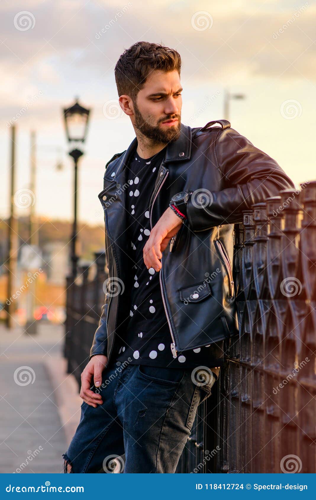 Young Man Leaning To the Fences Stock Photo - Image of hipster, city ...