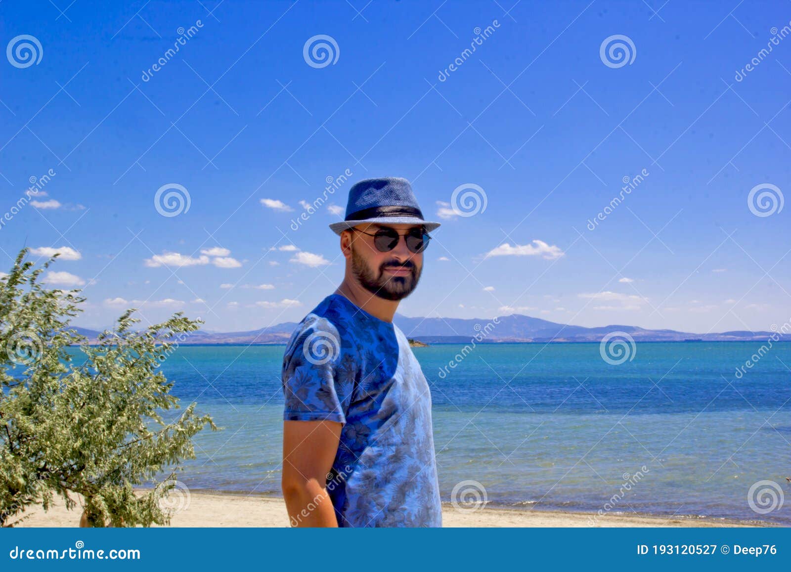Young Man in Sunglasses on the Beach Stock Image Image of beautiful