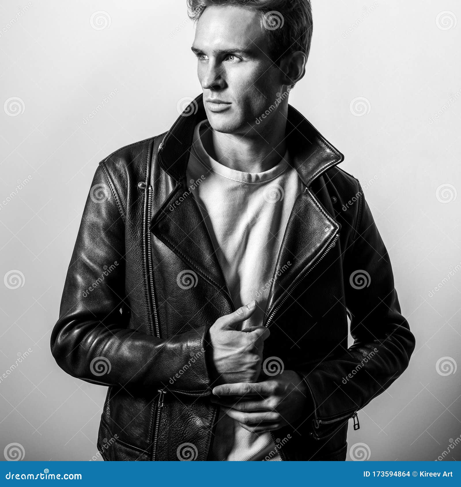 Handsome Young Man in Classic Leather Jacket. Black-white Studio ...
