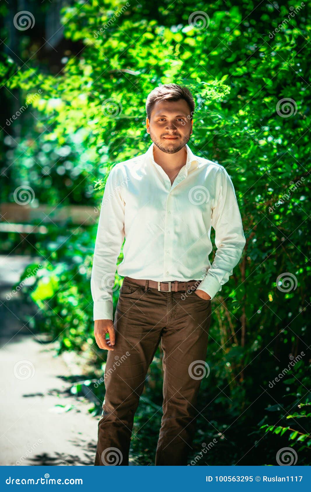 Handsome Young Man on Nature Background Stock Image - Image of hipster