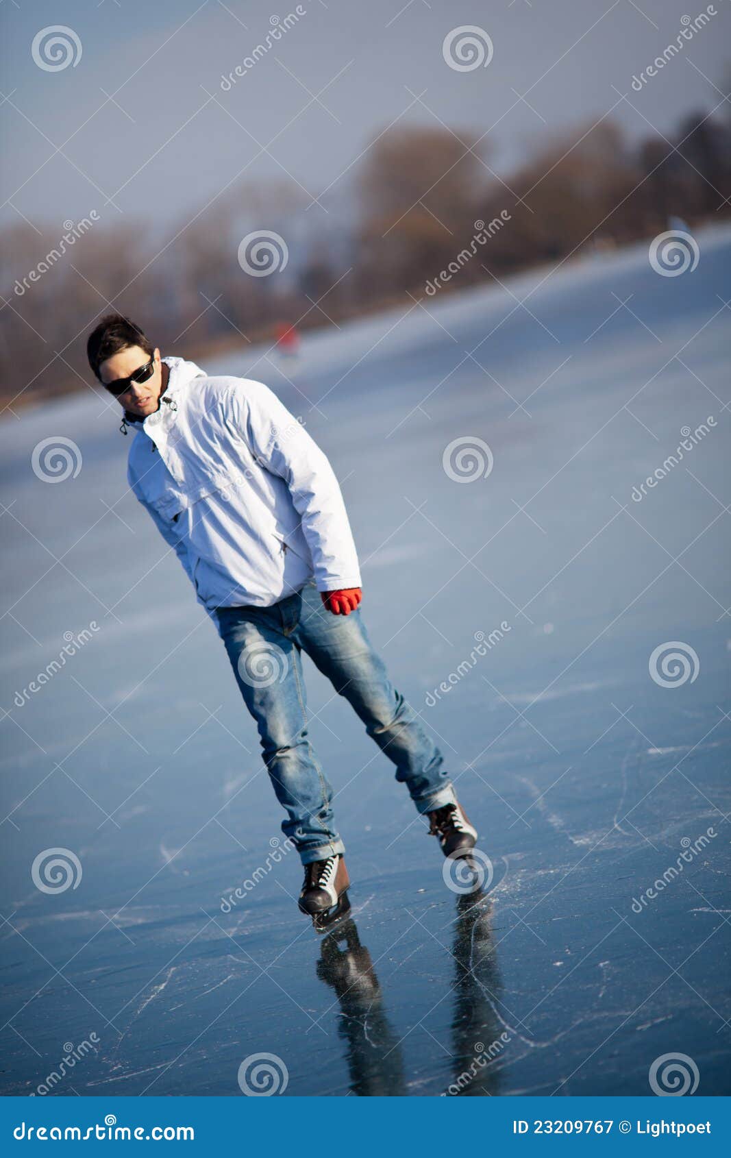 Handsome Young Man Ice Skating Outdoors on a Pond Stock Image Image