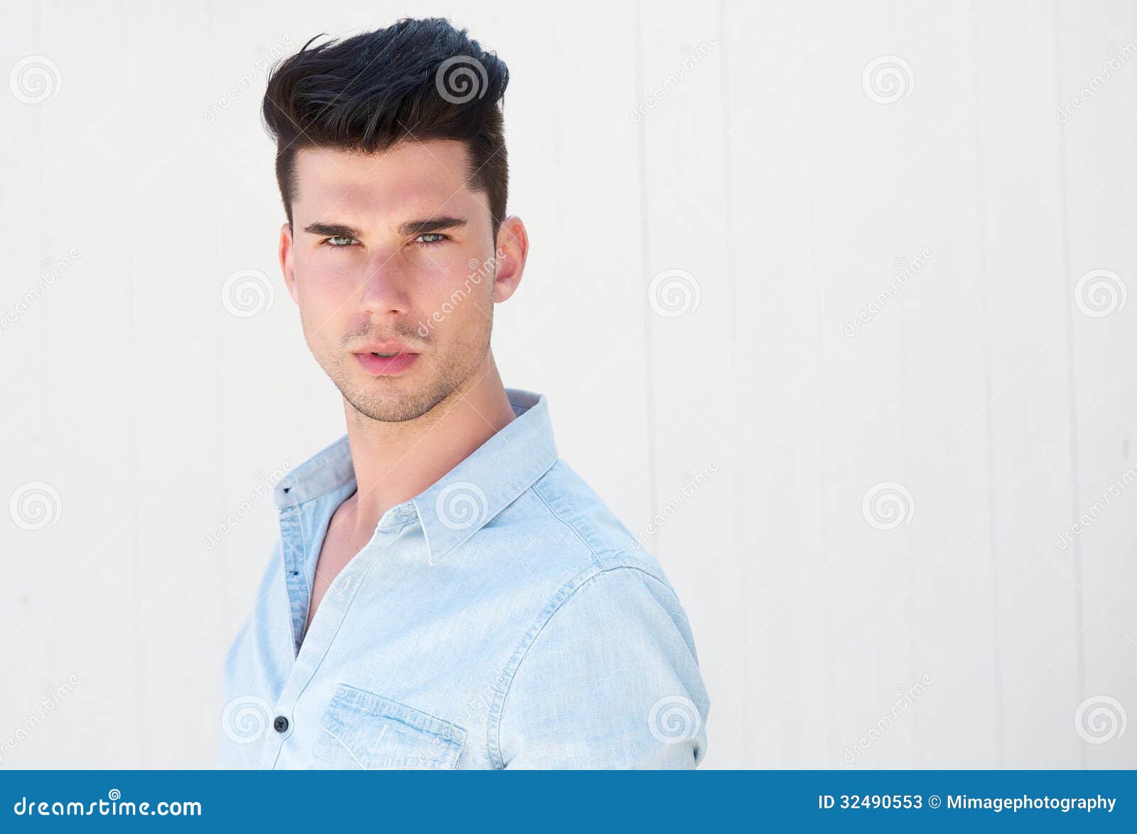 Profile View Of Serious Young Man Over White Background Stock Photo -  Download Image Now - iStock