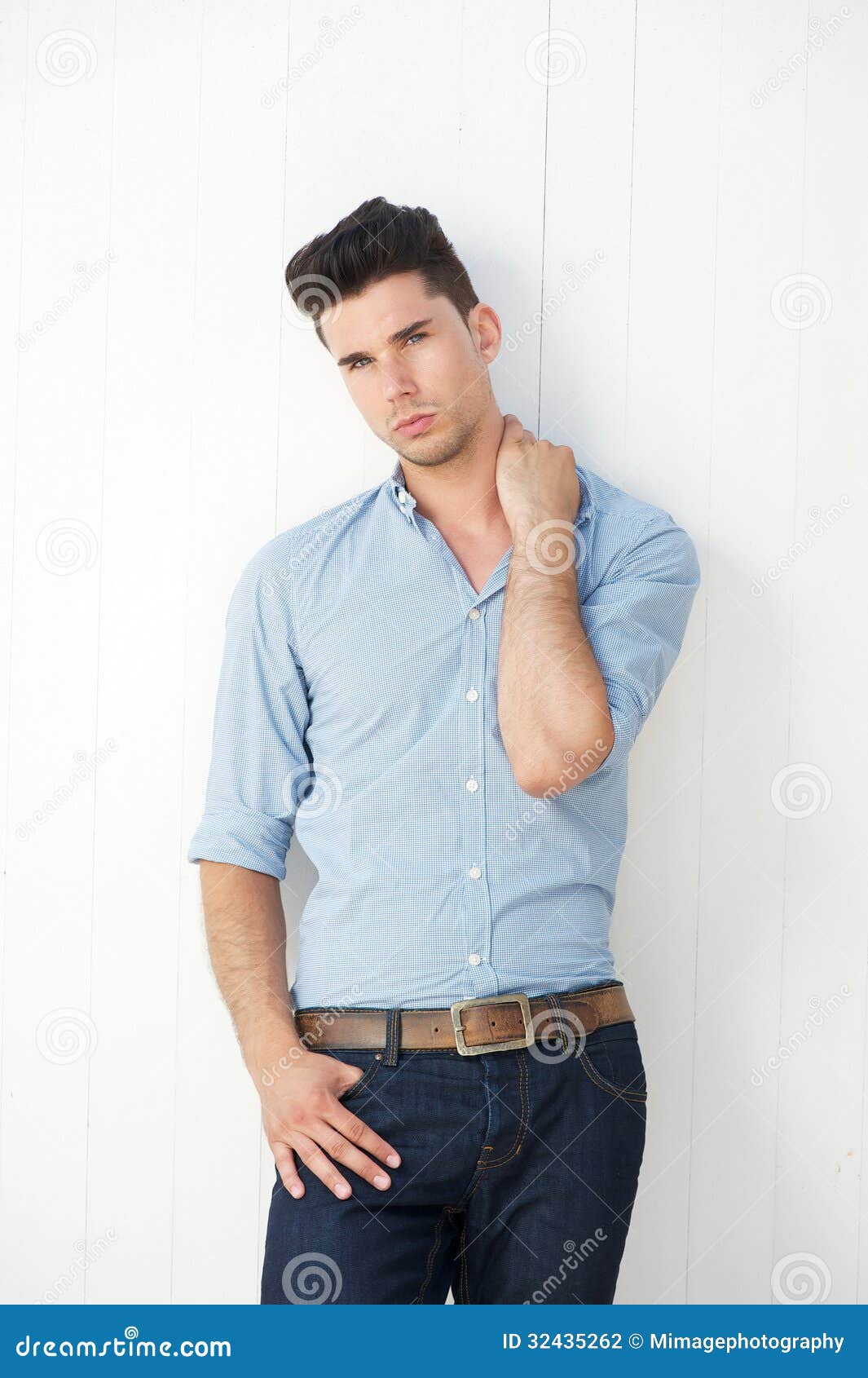 Handsome Young Man Standing Against White Background Stock 