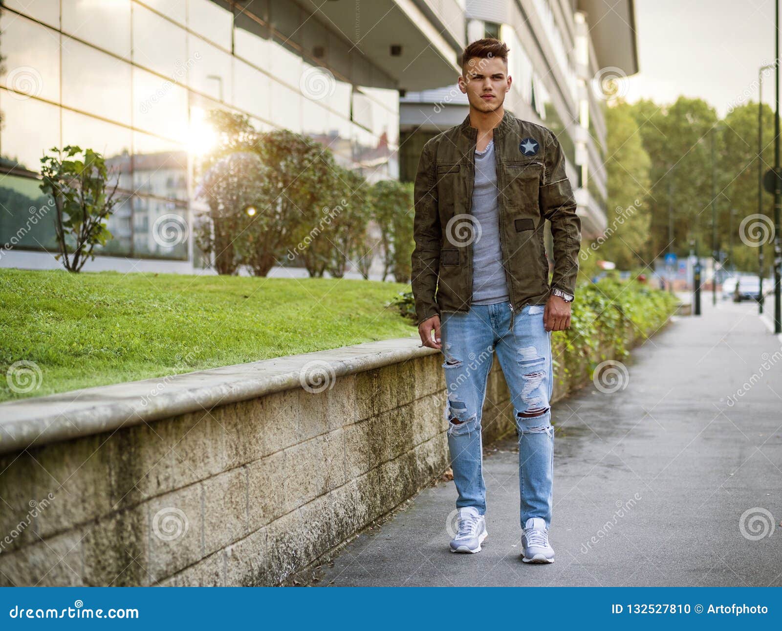 Handsome Young Man Walking in City with Backpack Stock Photo - Image of ...