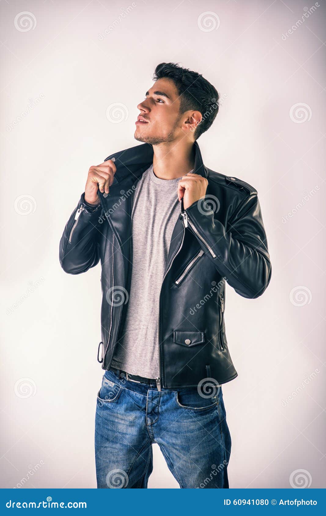 Handsome Young Man Wearing Leather Jacket, T-shirt Stock Photo ...
