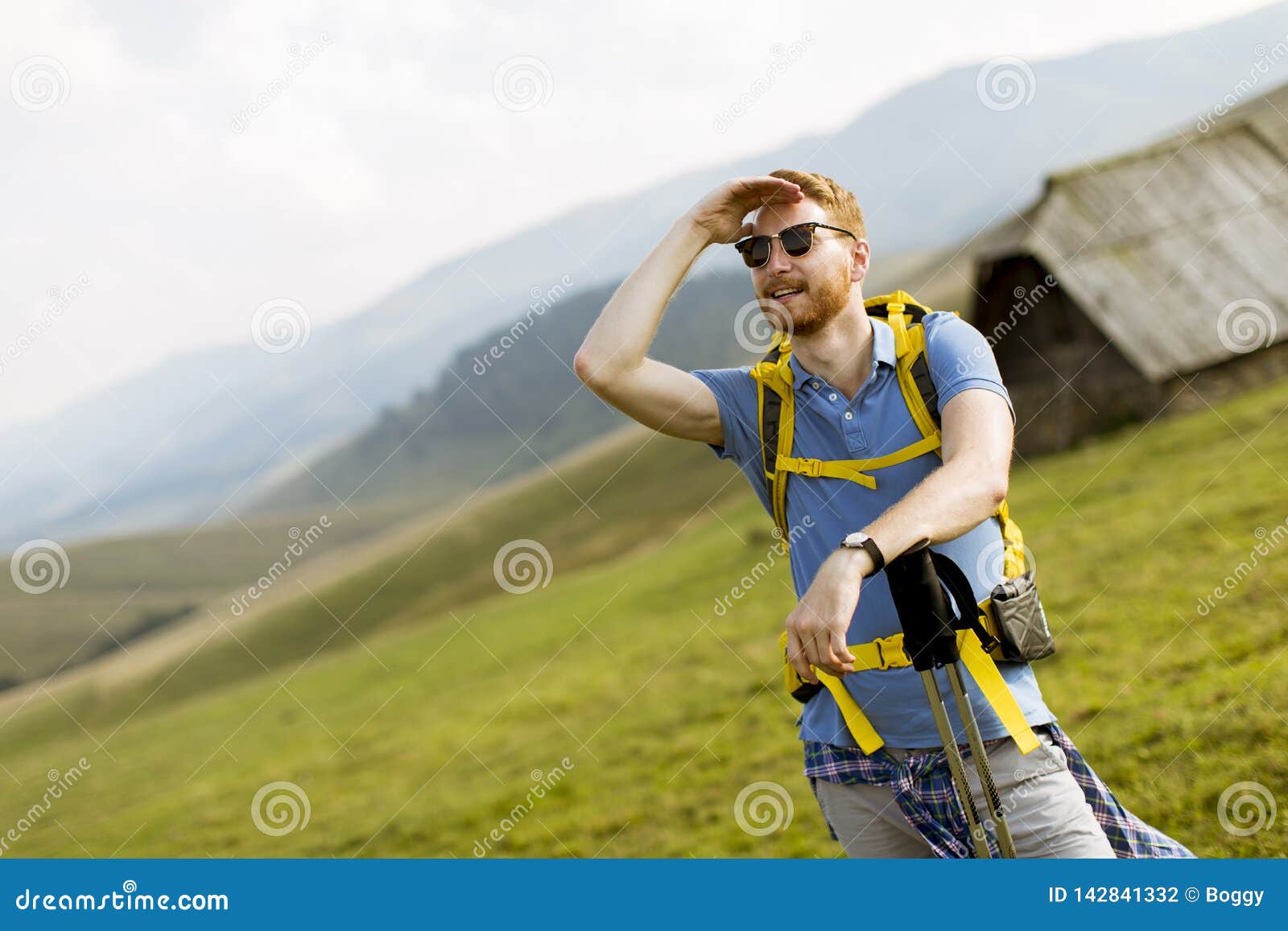 Handsome Young Red Hair Man with Sunglasses Hiking on the Mountain ...