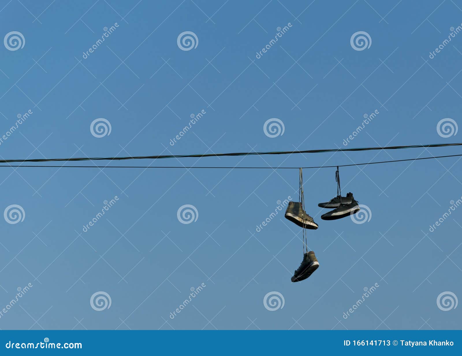 316 Shoes Hanging From Wires Stock Photos, High-Res Pictures, and Images -  Getty Images