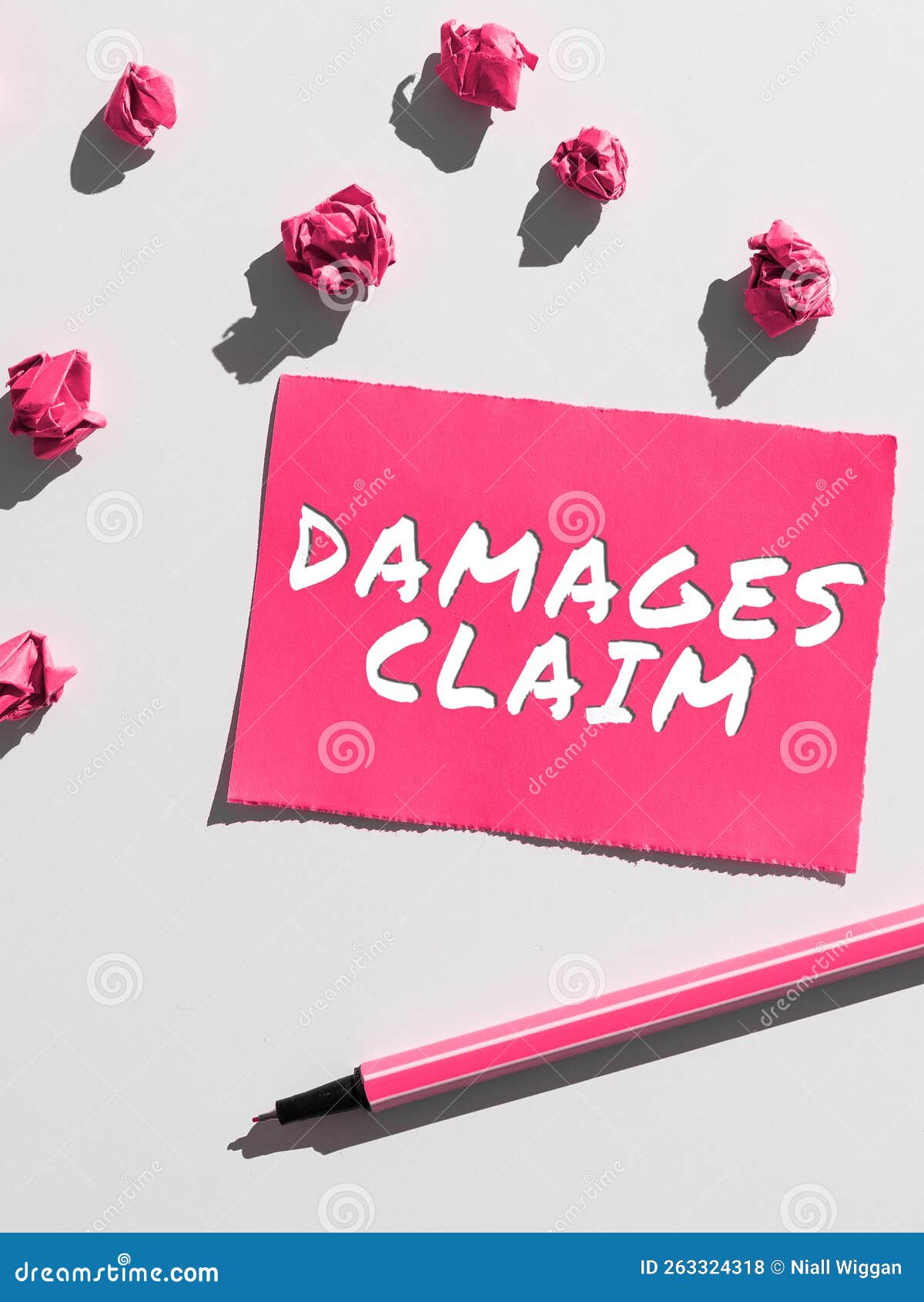 handwriting text damages claim. internet concept demand compensation litigate insurance file suit