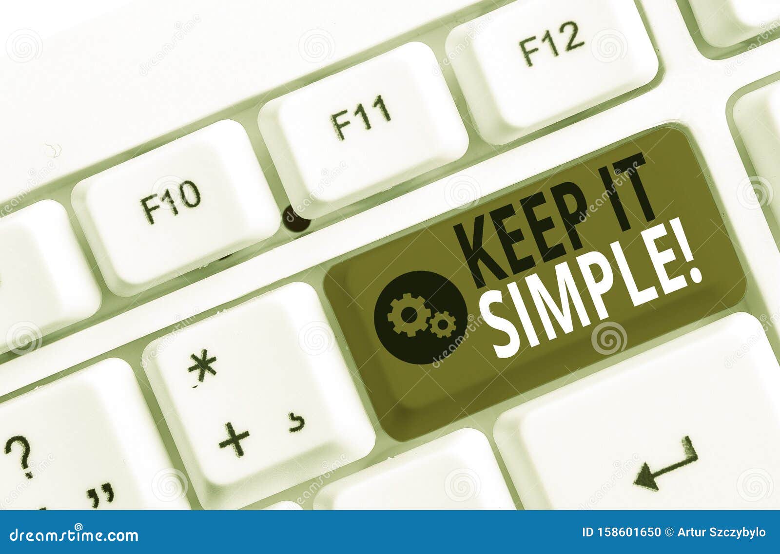 handwriting text keep it simple. concept meaning ask something easy understand not go into too much detail white pc keyboard with