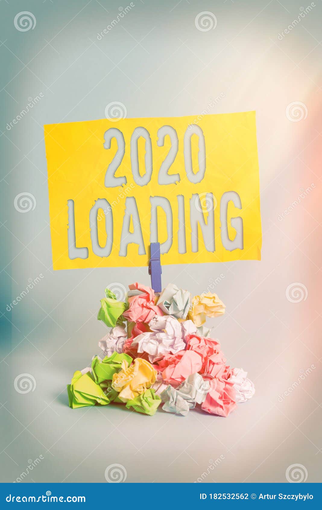 handwriting text 2020 loading. concept meaning advertising the upcoming year forecasting the future event reminder pile colored