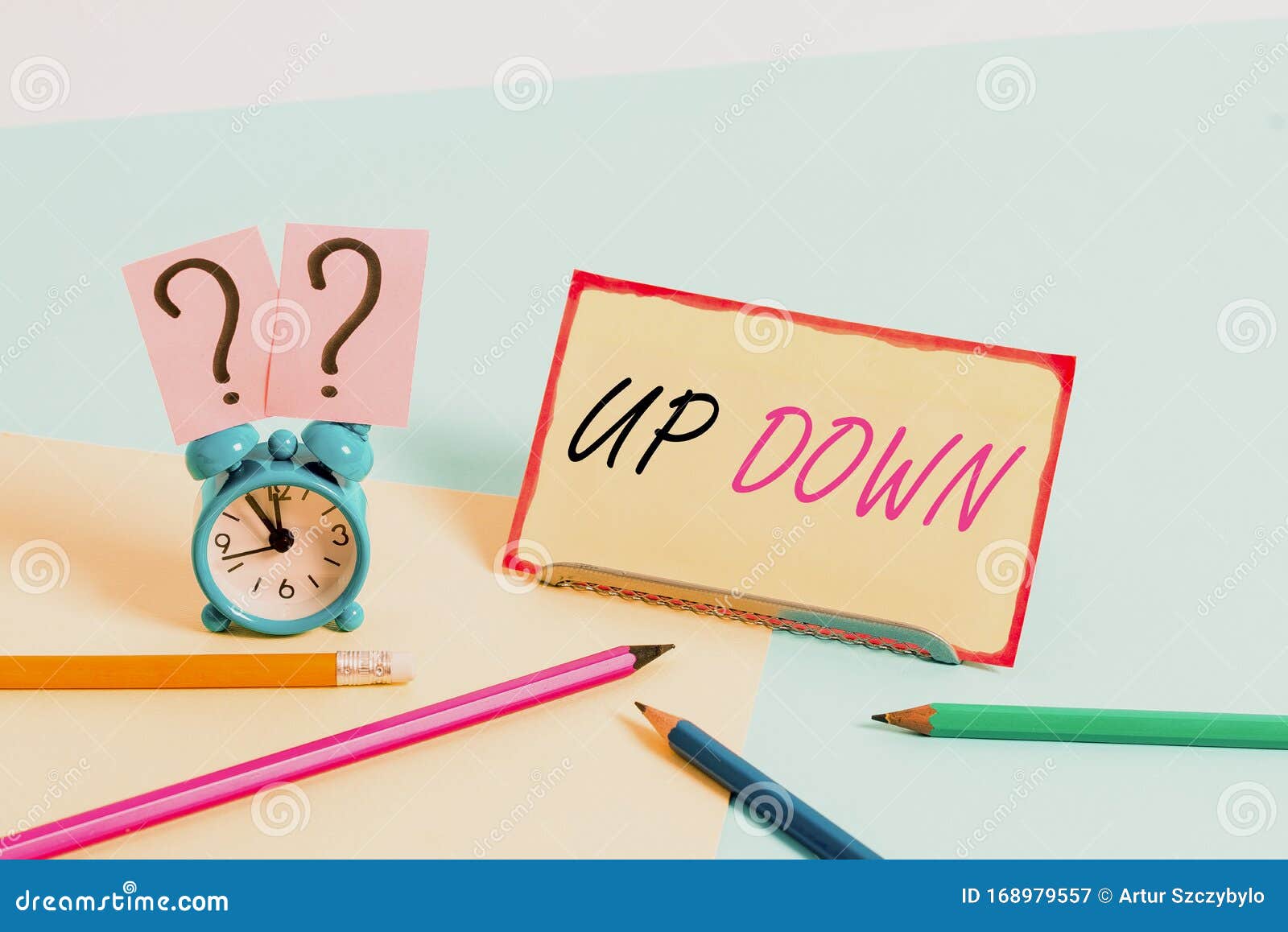 https://thumbs.dreamstime.com/z/handwriting-text-up-down-conceptual-photo-to-look-to-feel-updown-look-to-feel-absolutely-screwed-up-mini-size-alarm-clock-168979557.jpg