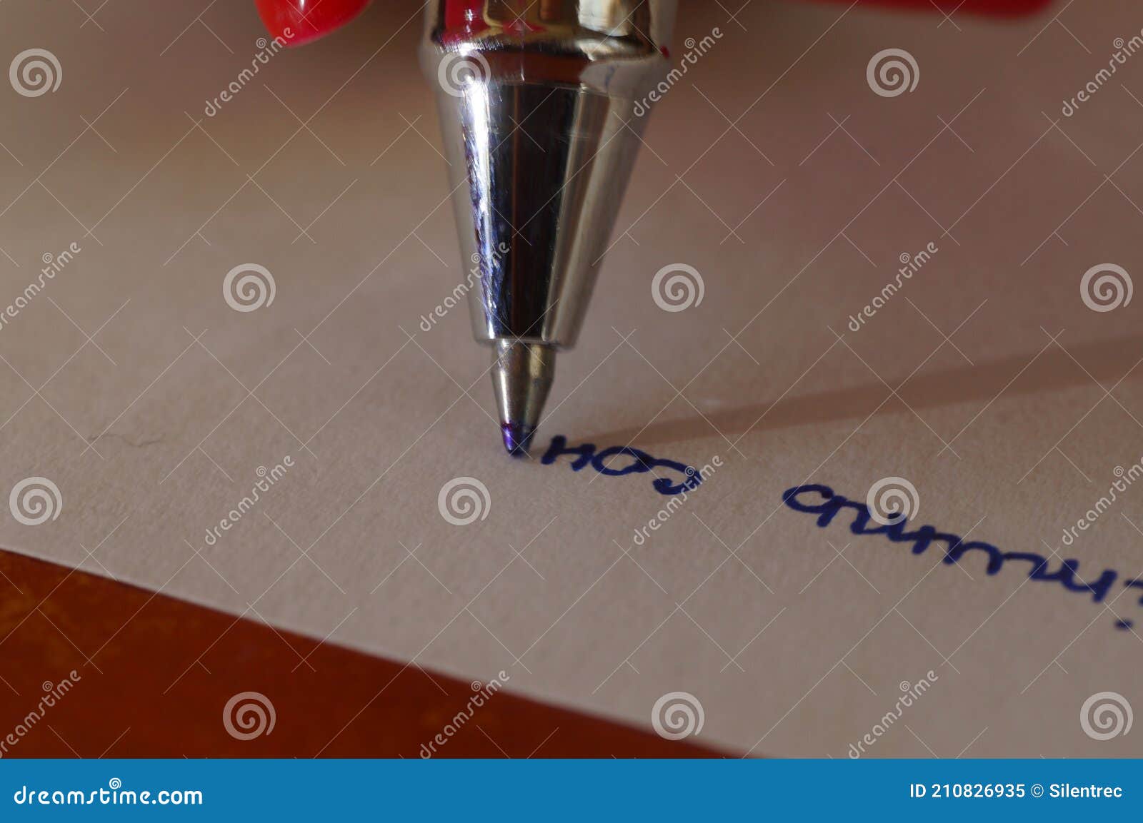 handwriting - writing text on a white sheet of paper