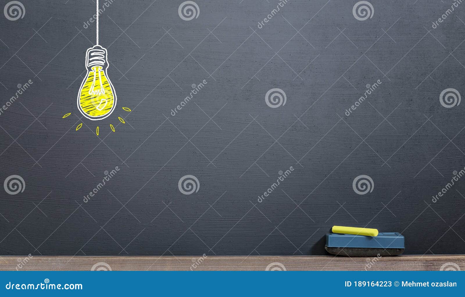 Handwriting Yellow Bulb on the Blackboard with Chalk, Idea Concept