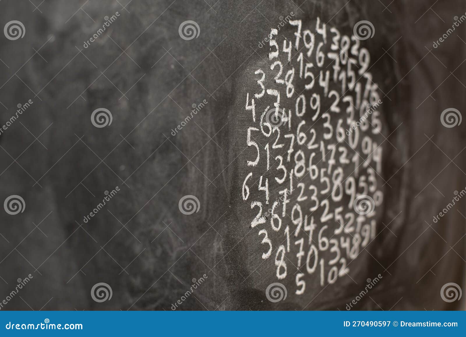handwritten numbers on a blackboard with chalk