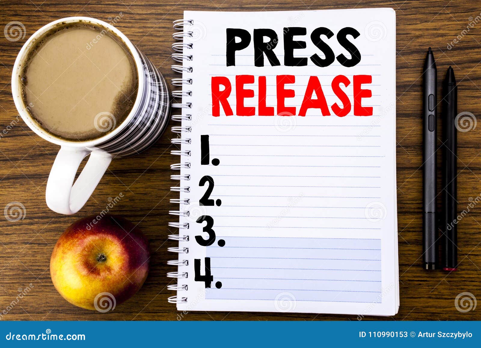 handwritten text showing press release business concept for
