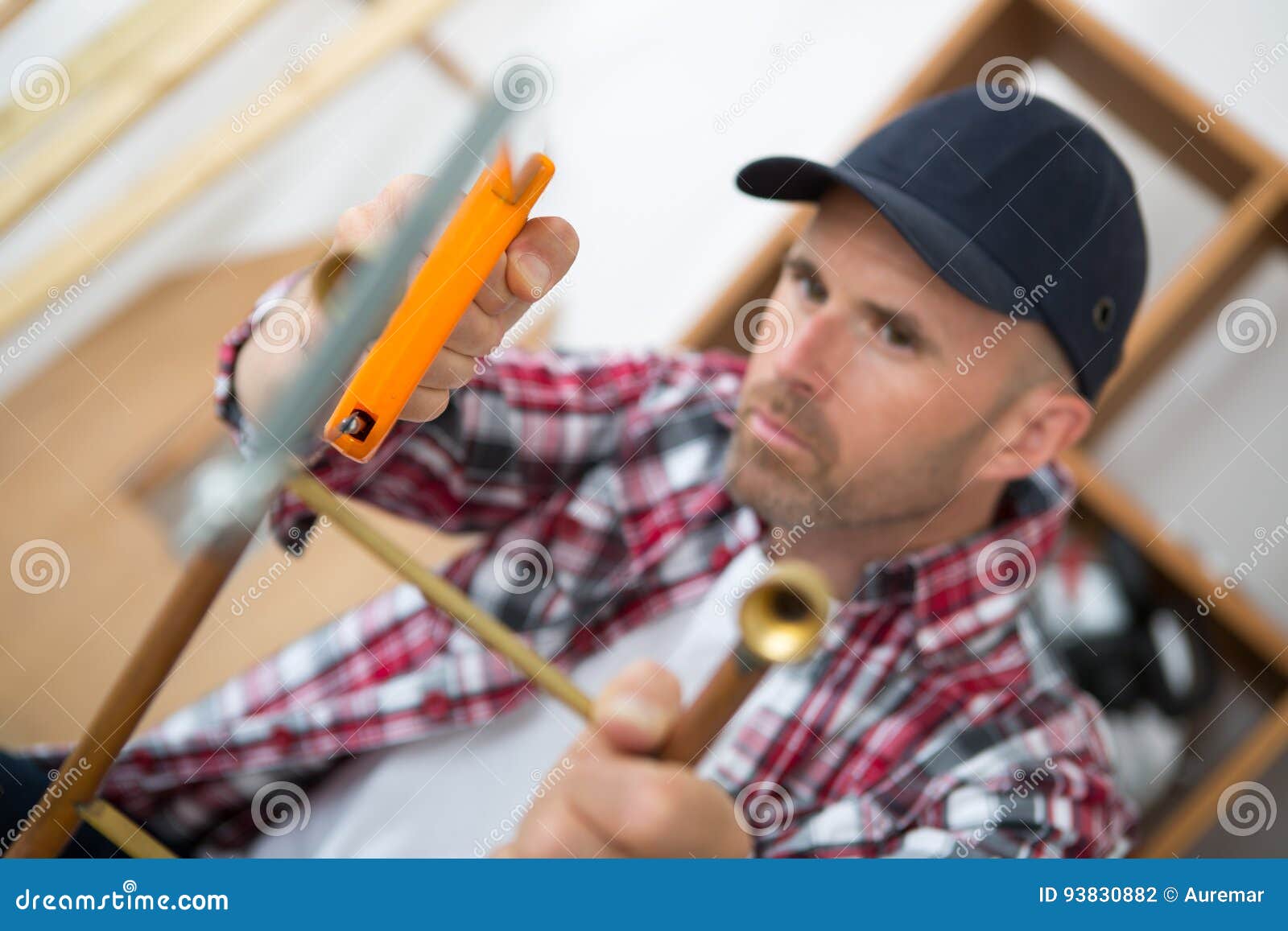 Handyman Cutting Metal with Hand Saw in Garage Stock Photo Image of