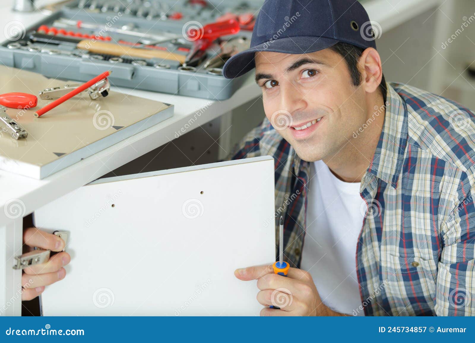 Handyman Fixing Door in Kitchen Stock Image Image of handyman