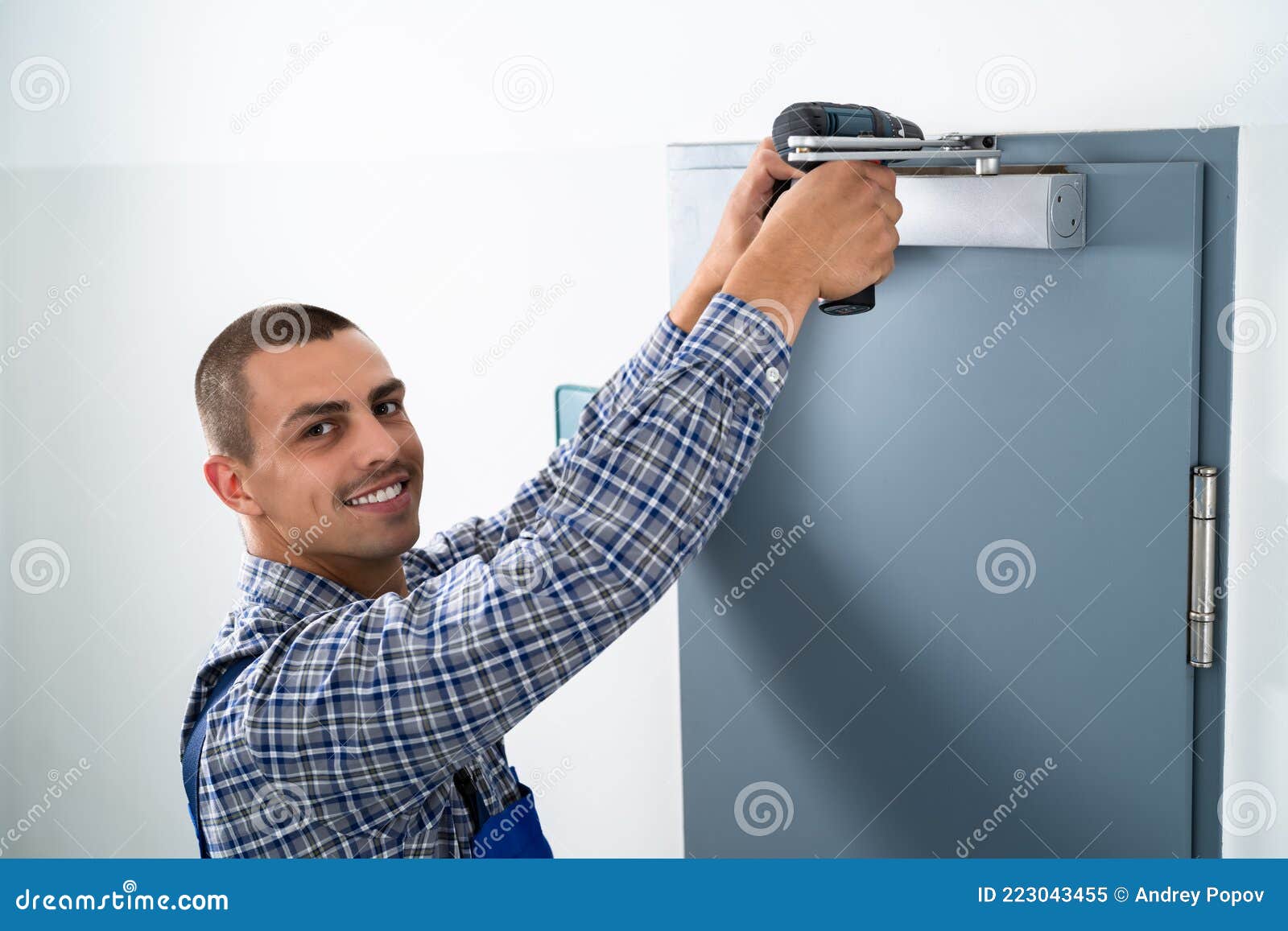 Handyman Installing and Fixing Door Closer Stock Image Image of