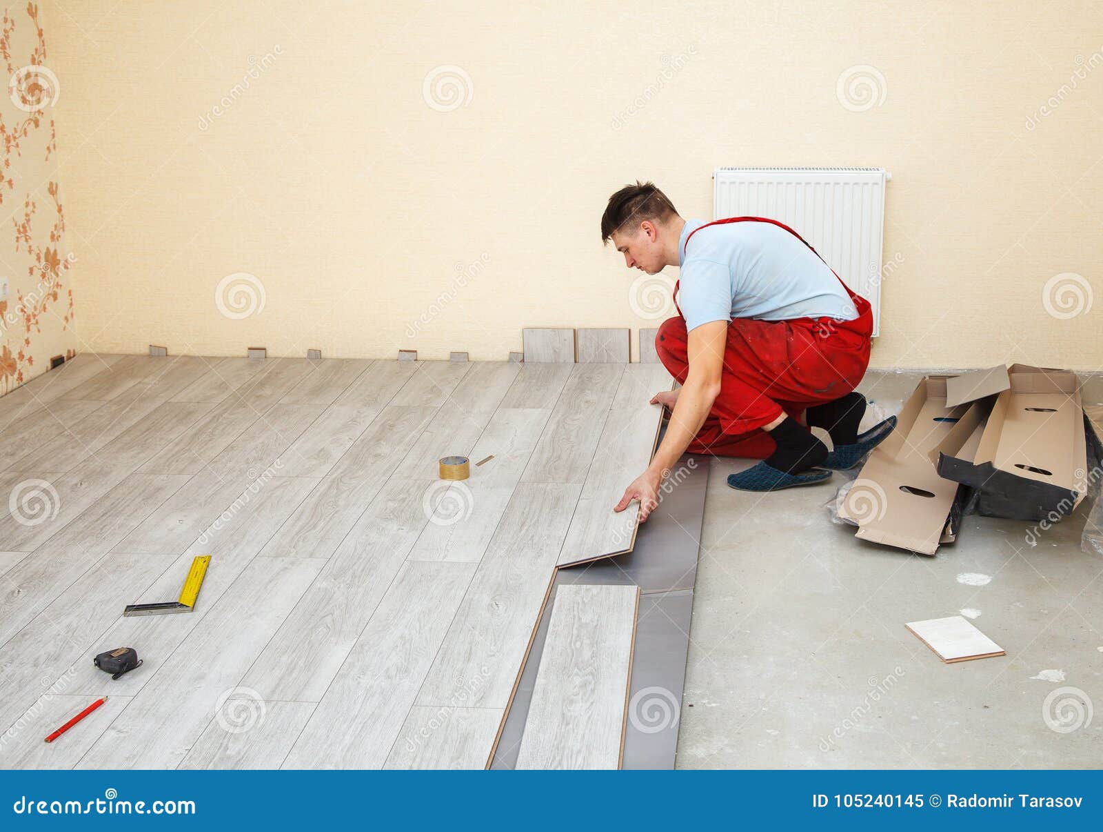 Handyman Laying Down Laminate Flooring Boards Stock Image Image