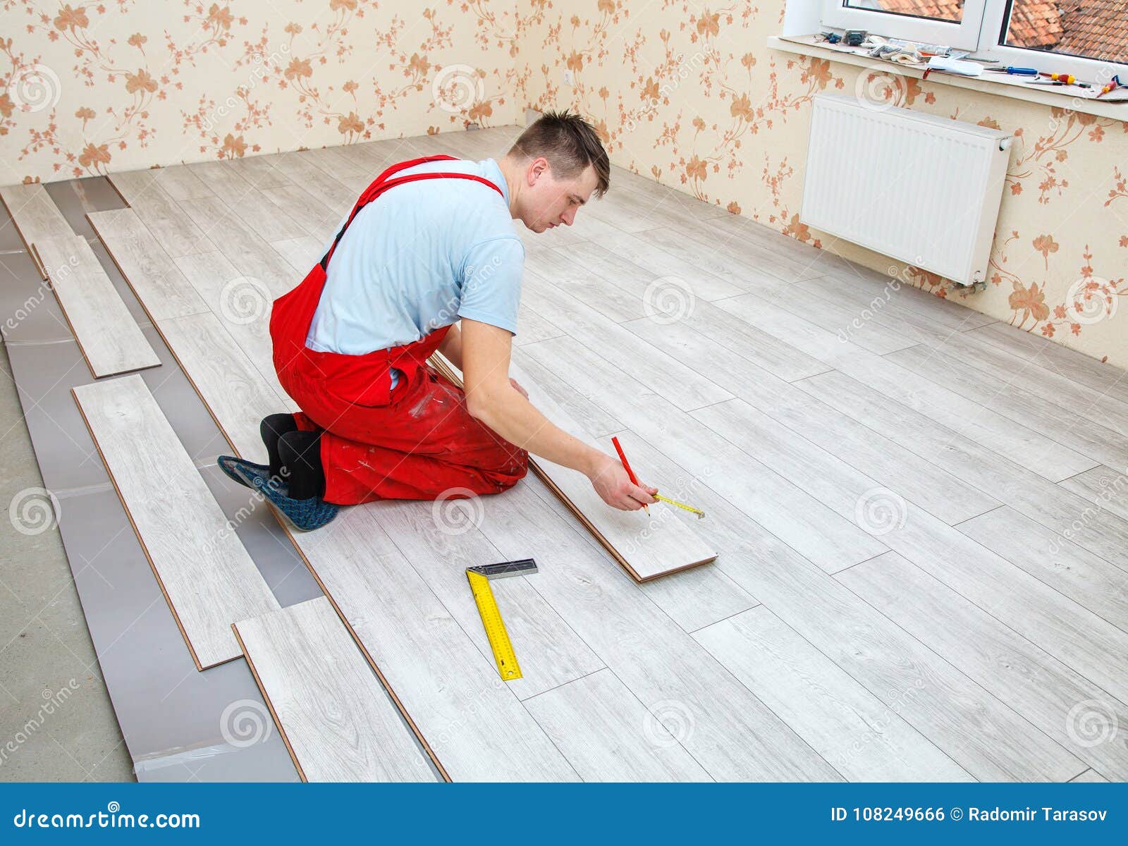 Handyman Laying Down Laminate Flooring Boards Stock Photo Image
