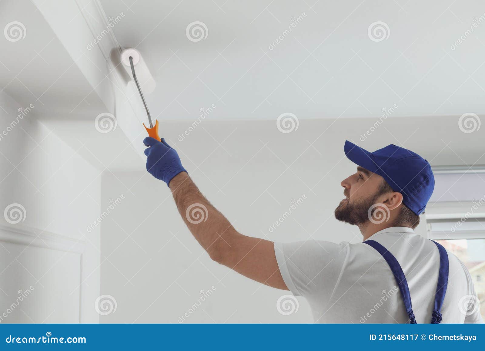 Handyman Painting Ceiling with White Dye Indoors Stock Image Image of