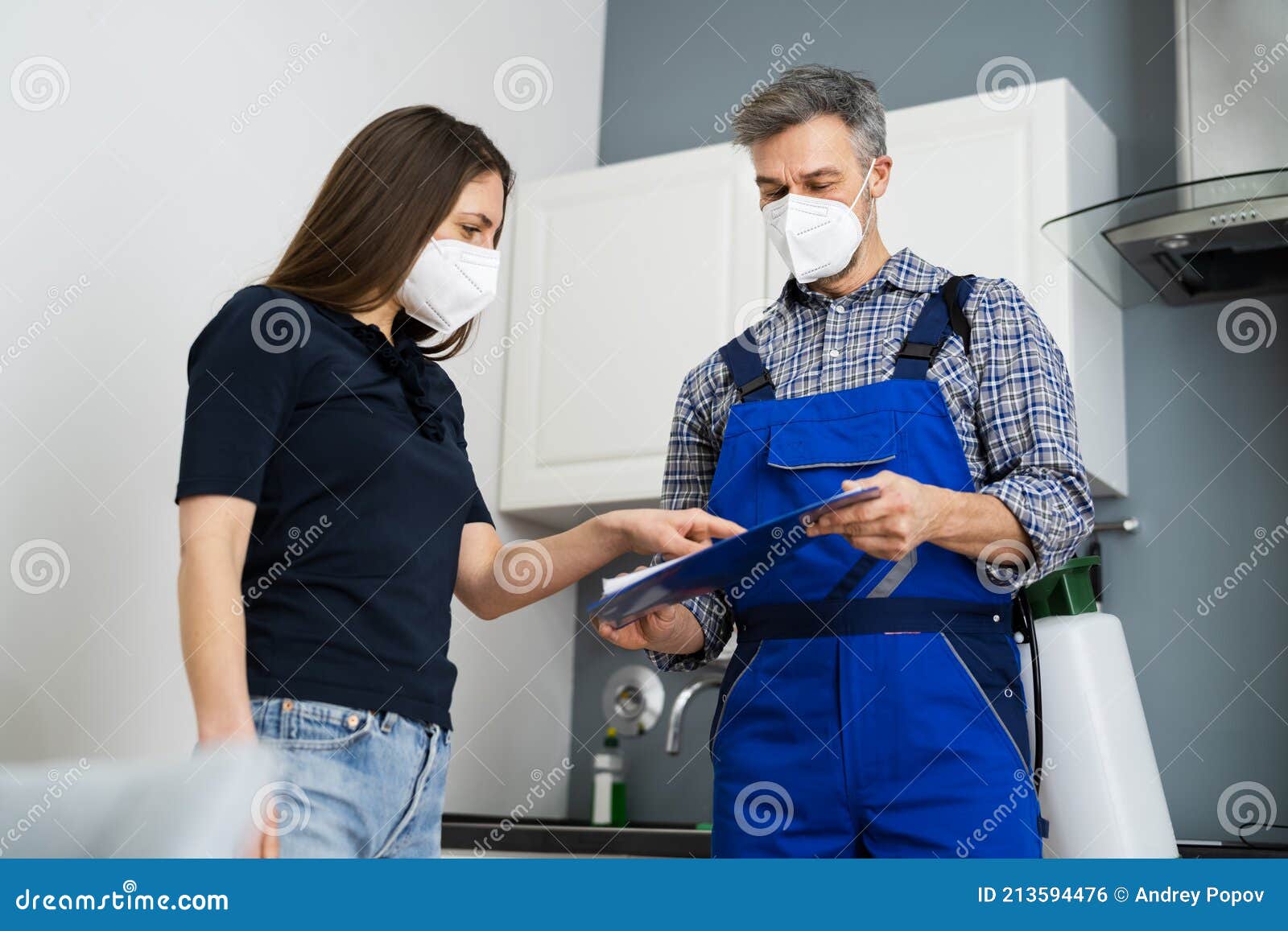 Handyman Plumber and Customer with Service Contract Stock Photo Image