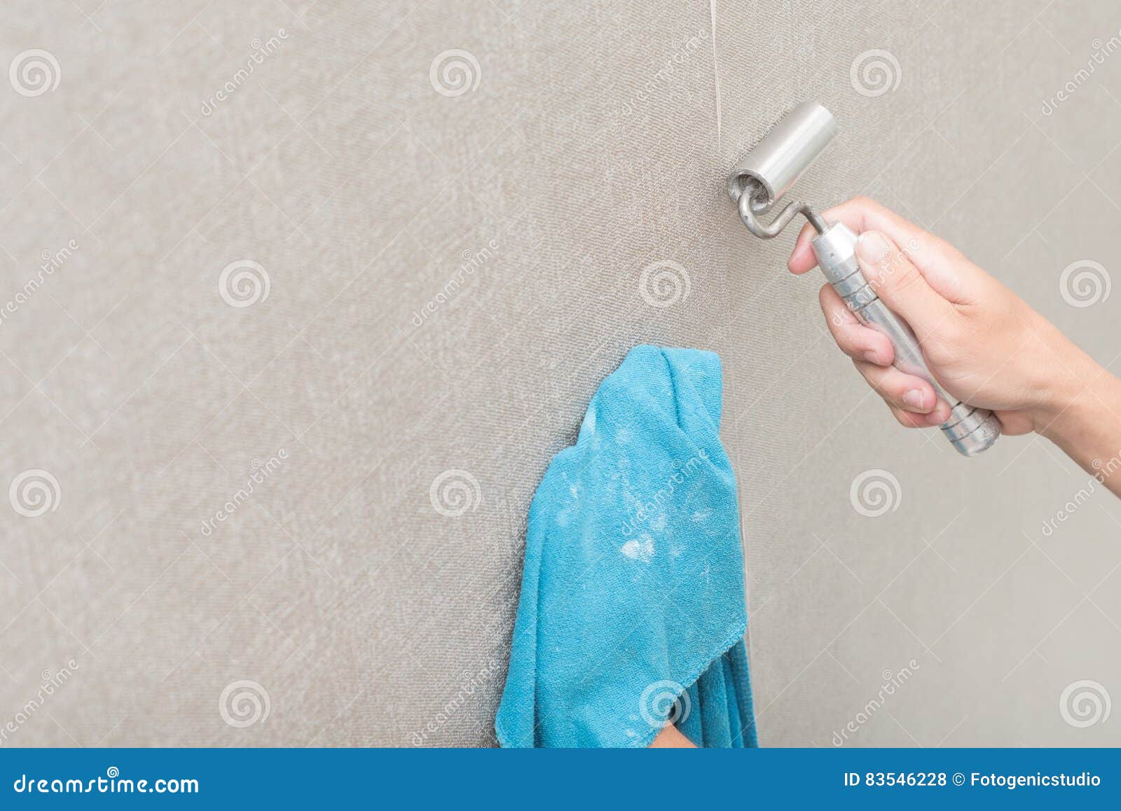 Handyman Putting Up Wallpaper on the White Walls Stock Photo Image of