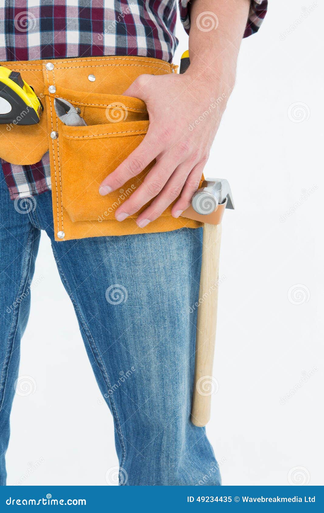 Handyman wearing tool belt stock image. Image of tape 49234435