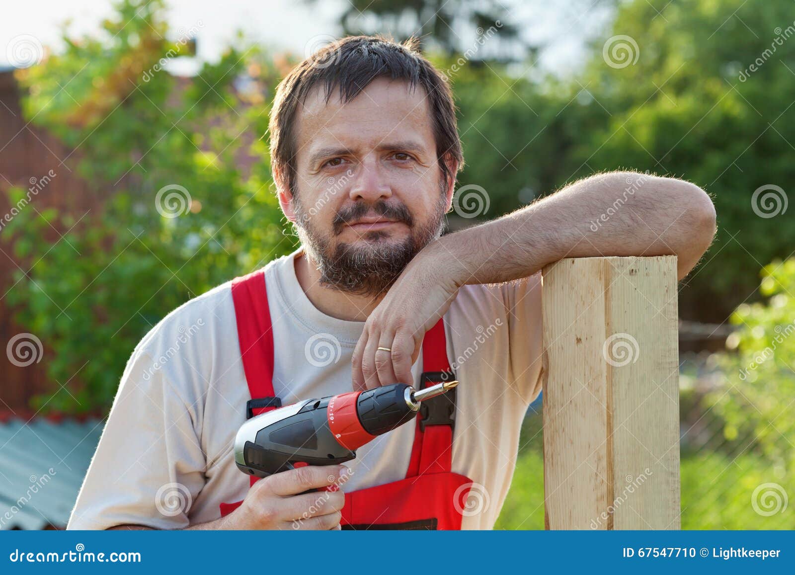 Handyman Working in the Yard Stock Photo Image of people, outside