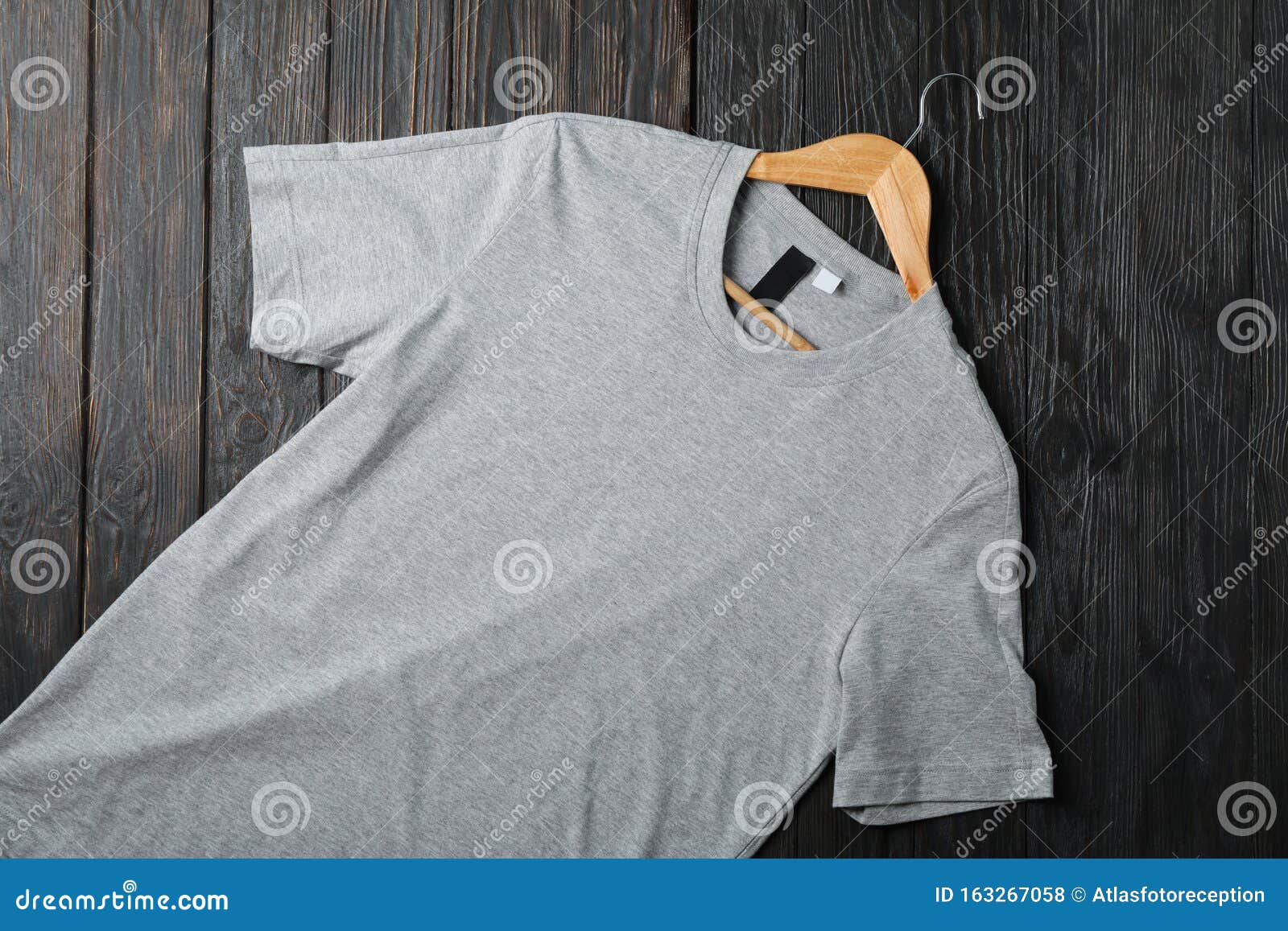 https://thumbs.dreamstime.com/z/hanger-blank-gray-t-shirt-wooden-background-hanger-blank-gray-t-shirt-wooden-background-space-text-163267058.jpg