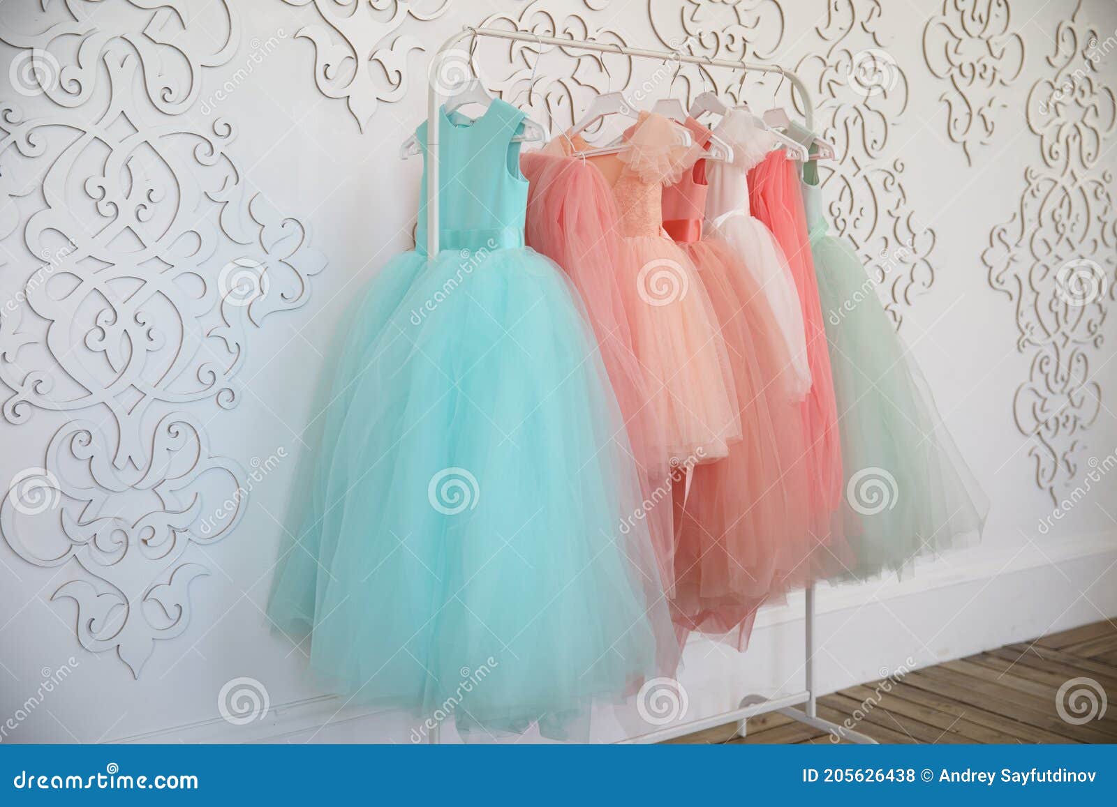 Hanger with Colorful Elegant Puffy Dresses for Girls. Holiday Wardrobe ...