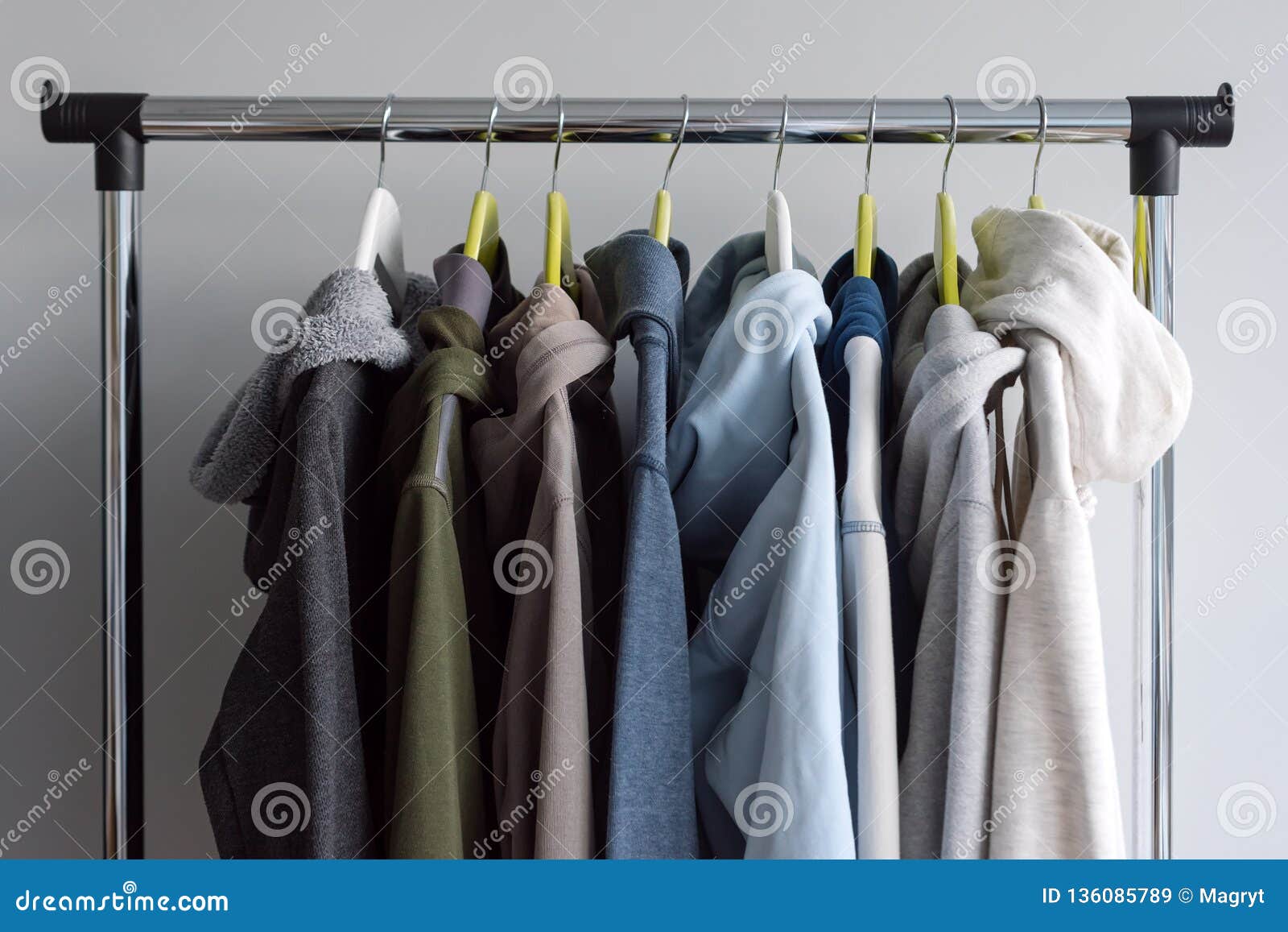 Hoodies, A Sweater And A Hoodie On A Hanger In A Fashion Store For Stock  Photo Image Of Clothes, Cloth: 154966756