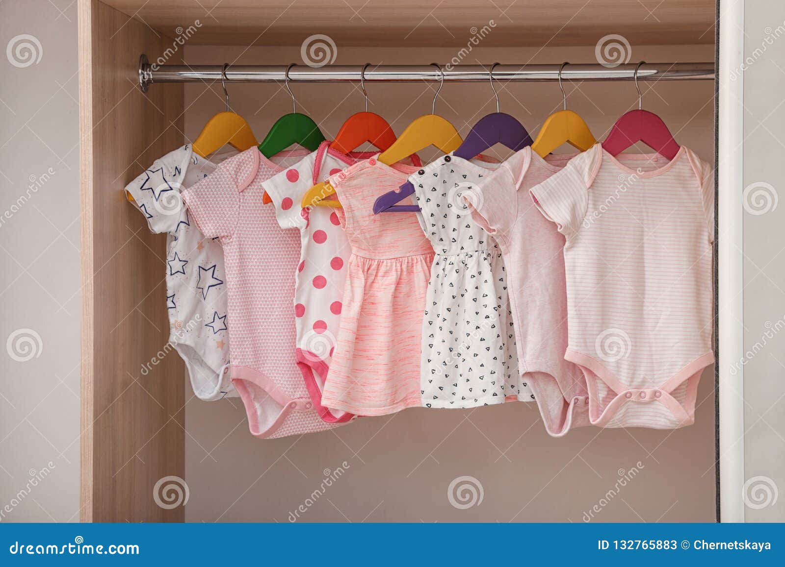 Baby Clothes Hanging On Rack Store Stock Photo 1936987804
