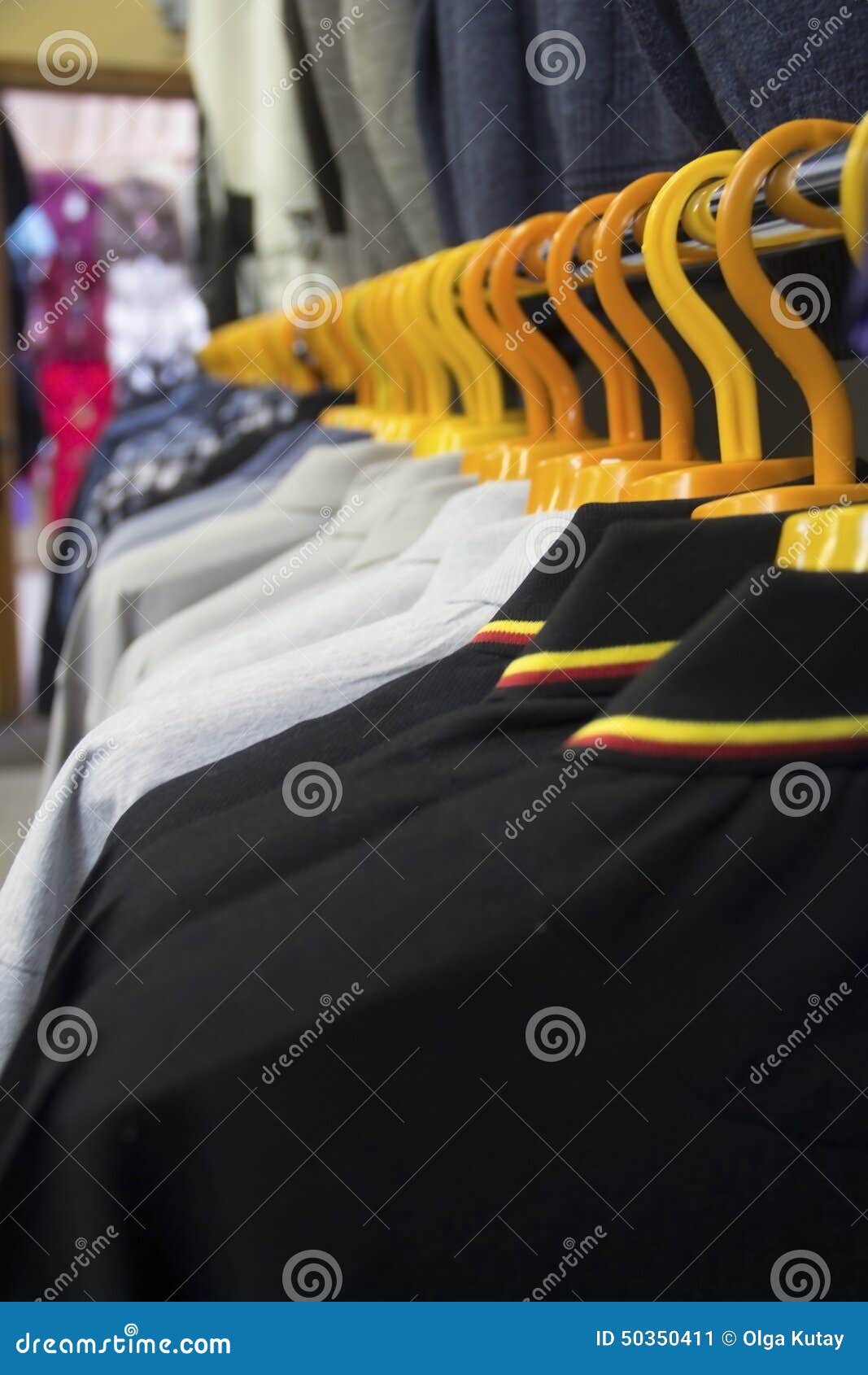 Hangers with mens clothes stock image. Image of decisions - 50350411